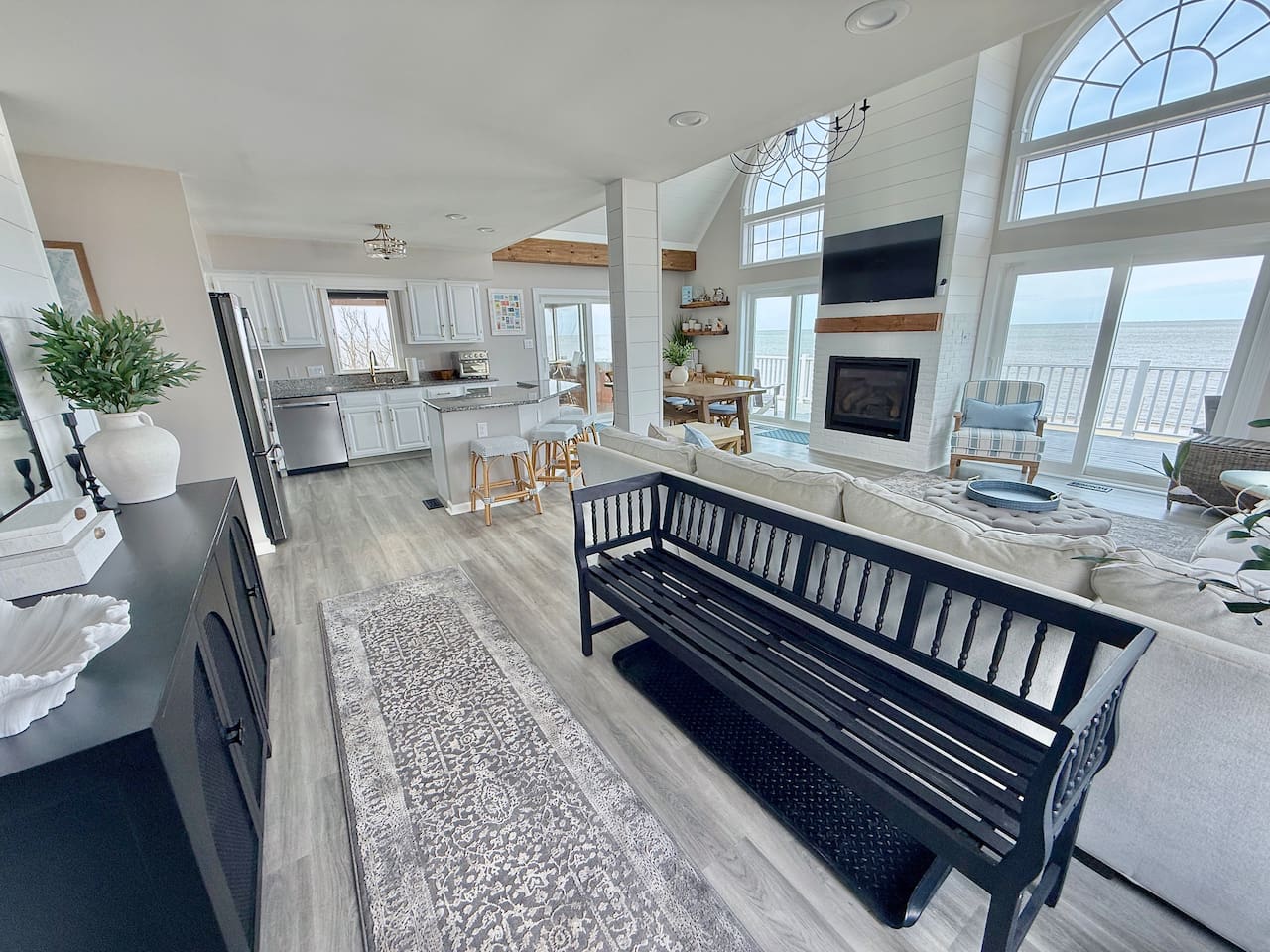 Enjoy luxury living in this spacious, open-concept floor plan. Featuring a gourmet kitchen, cozy seating area, and breathtaking ocean views through large windows, it is designed for effortless coastal elegance.