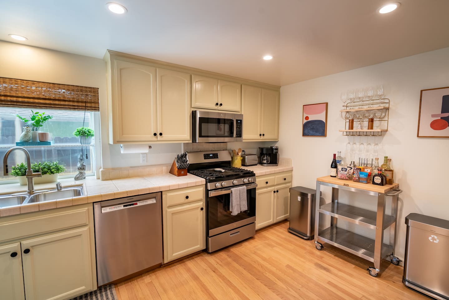 Full stocked kitchen with island seating for three
