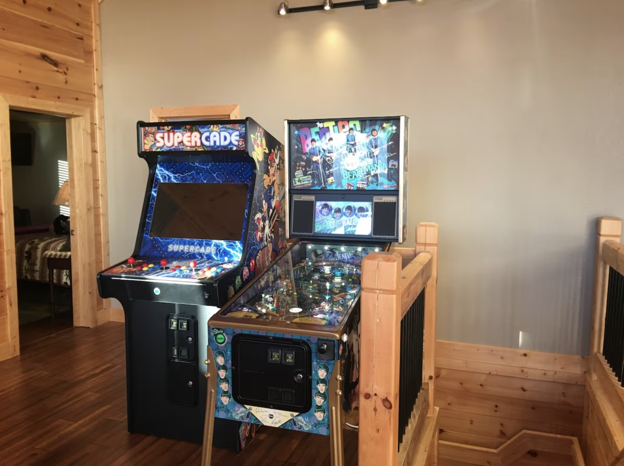 The loft on the second floor has an arcade machine fit with hundreds of classic arcade games, and a retro Beatles pinball machine!