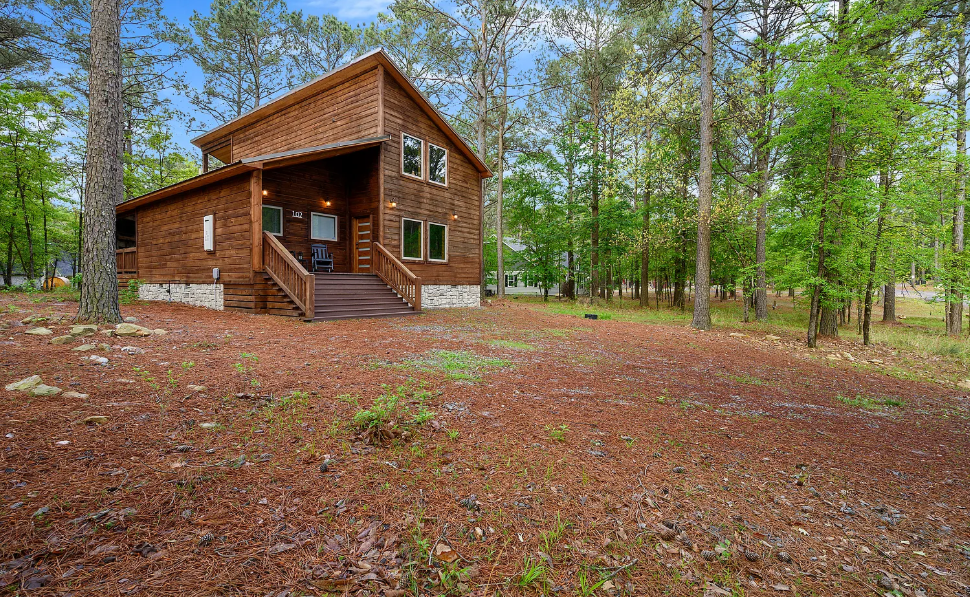 Cozy cabin retreat nestled among towering trees and natural beauty