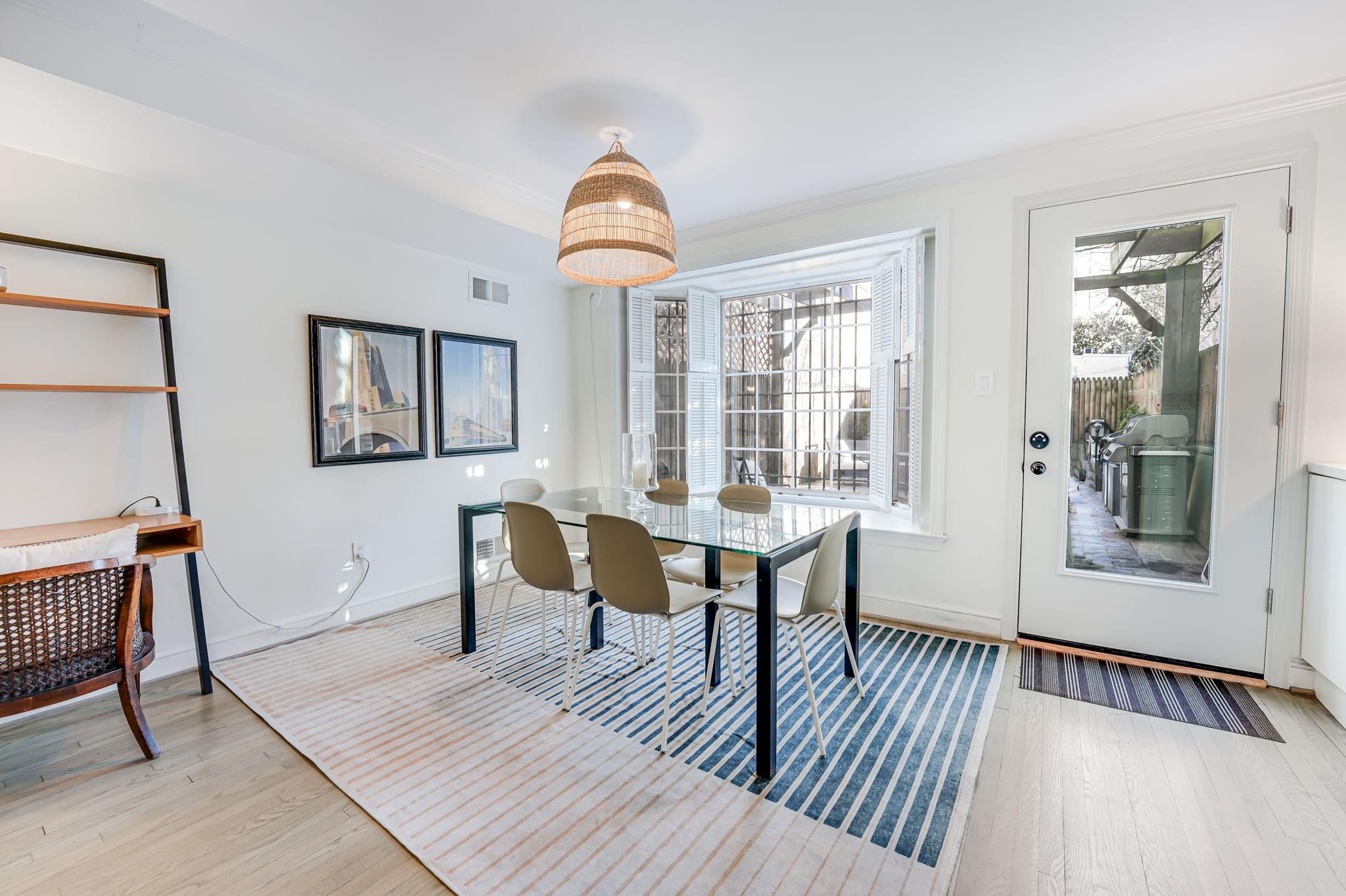 Dining Room: Seating for 6, Desk, Rear Door to Patio, Free Parking, EV Charging.
