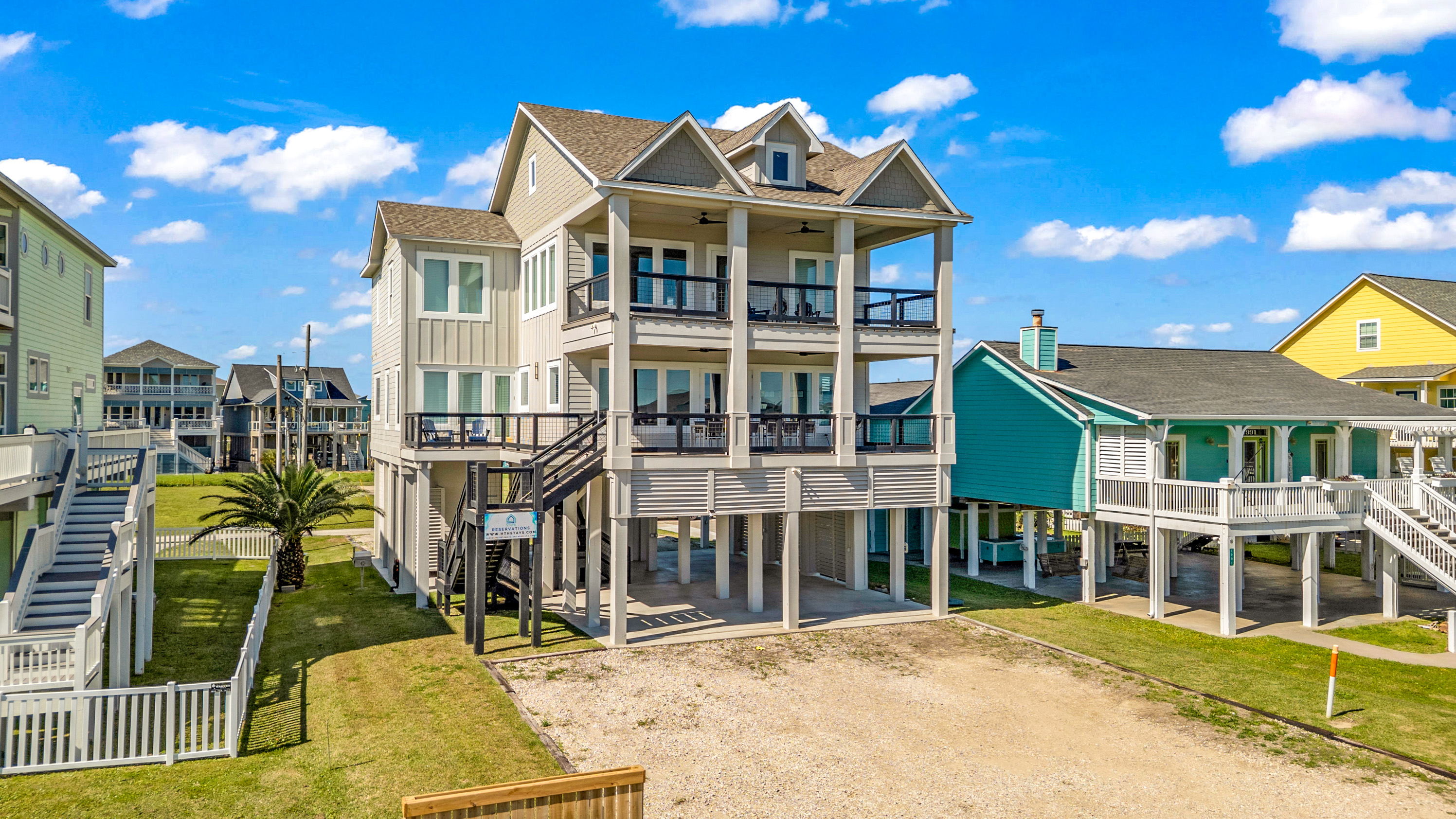 Costa Cristal Exterior: Bold and majestic, showcasing its striking architecture, and a spacious garage that complements the luxury design.