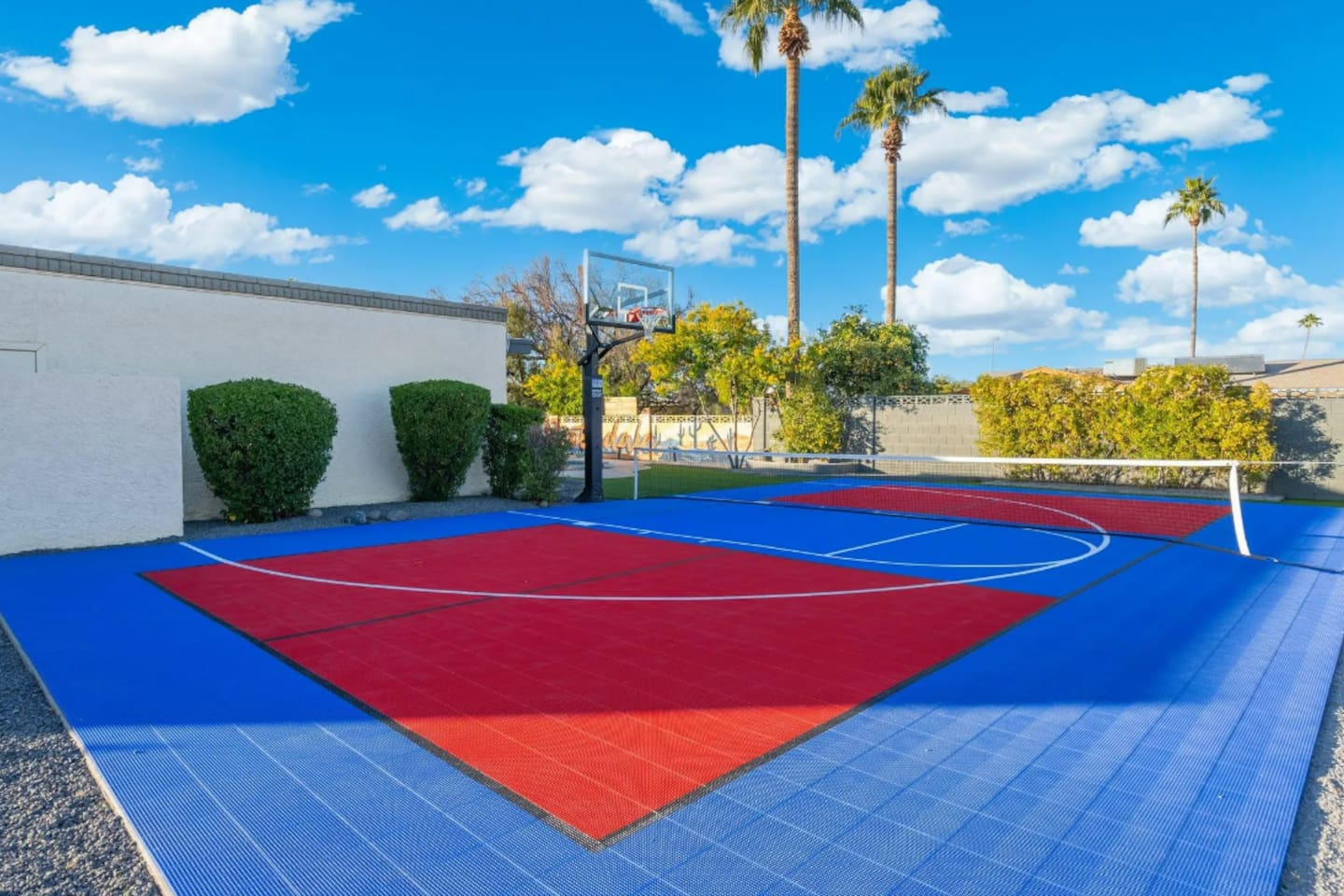 A full-size hoop and painted court lines mean pickup games are always on the table.
