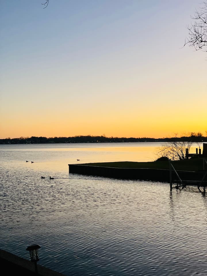 Peaceful lake view of the home stretching across Paw Paw Lake.