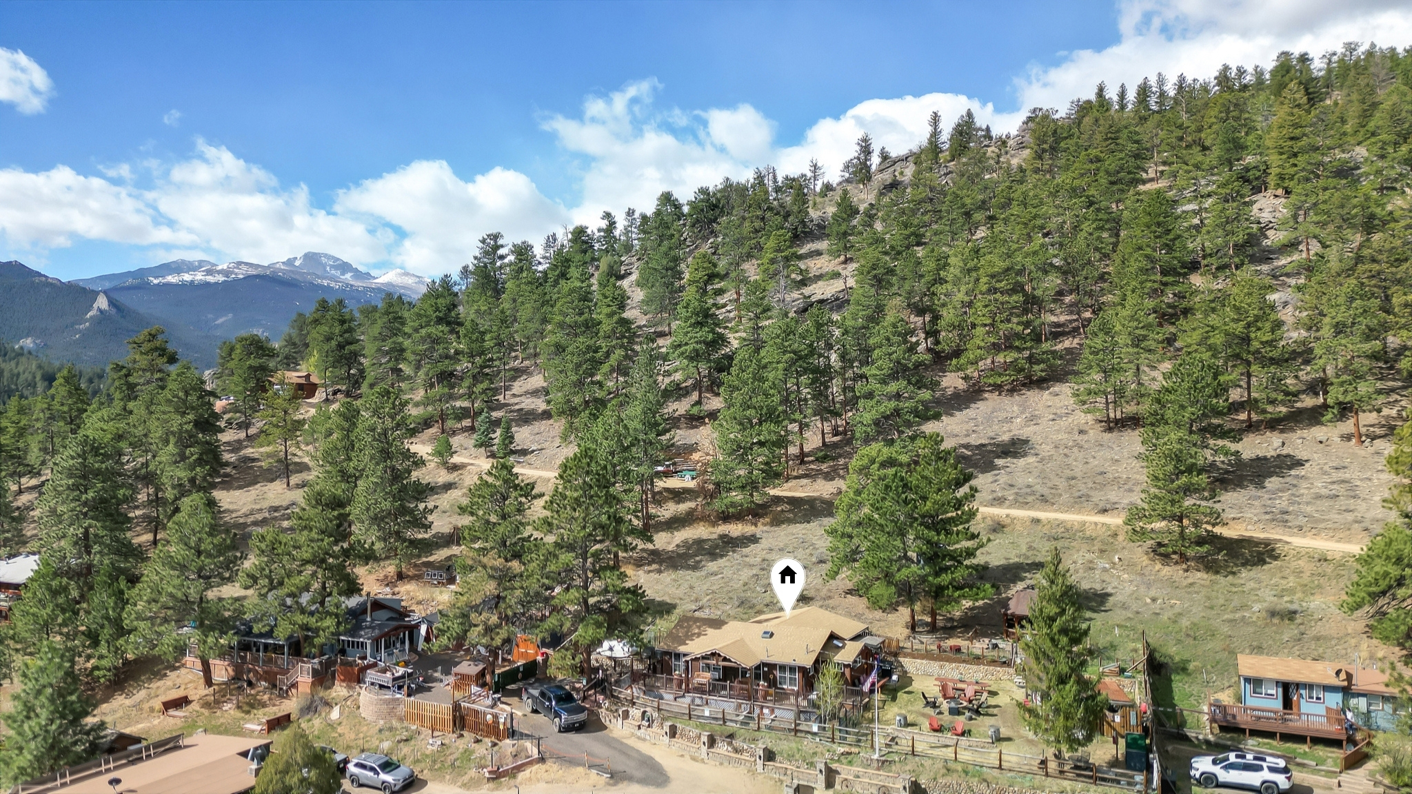 Perched above the pines with sweeping Rocky Mountain views.