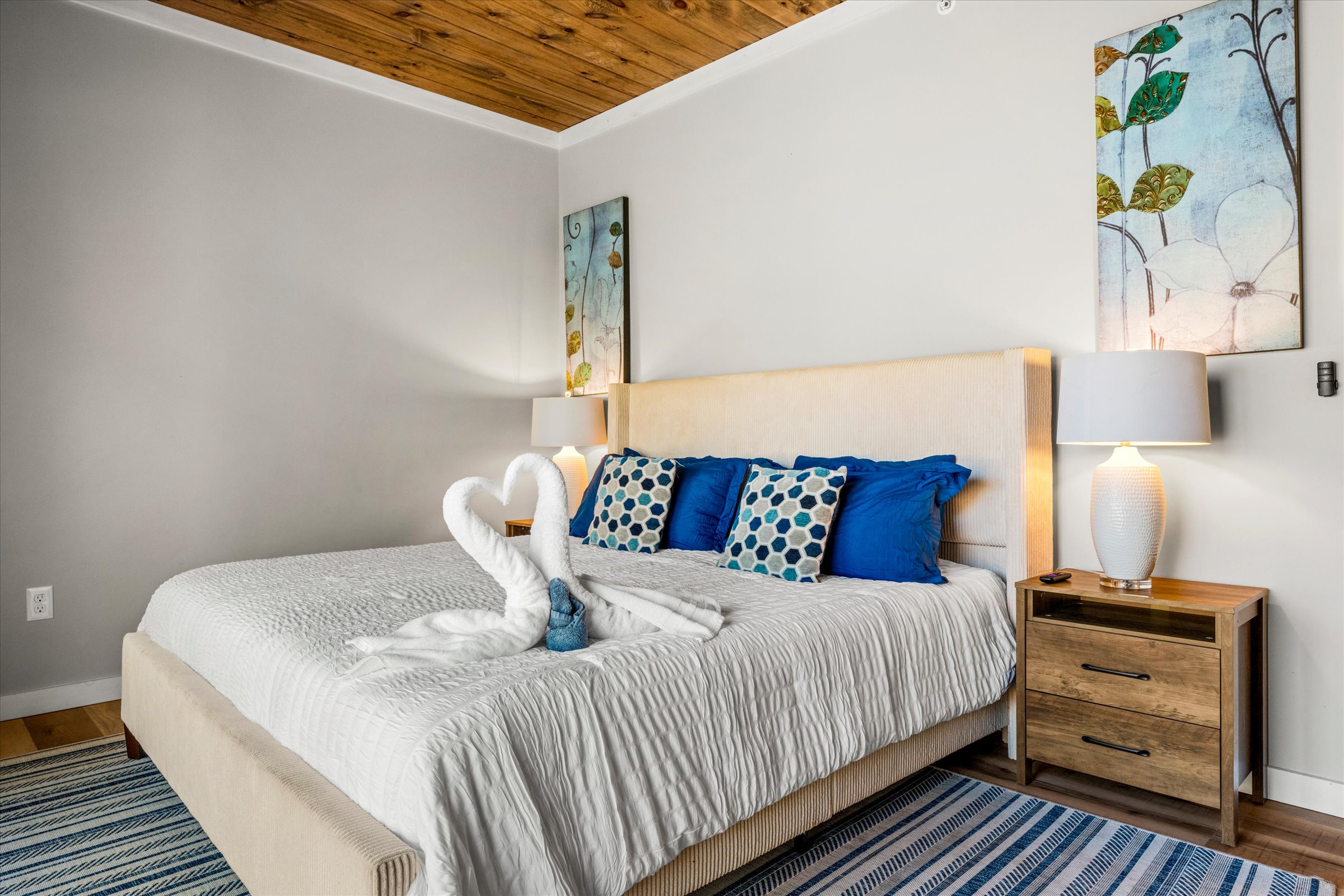 The second bedroom also includes a king bed and beautifully designed furniture.