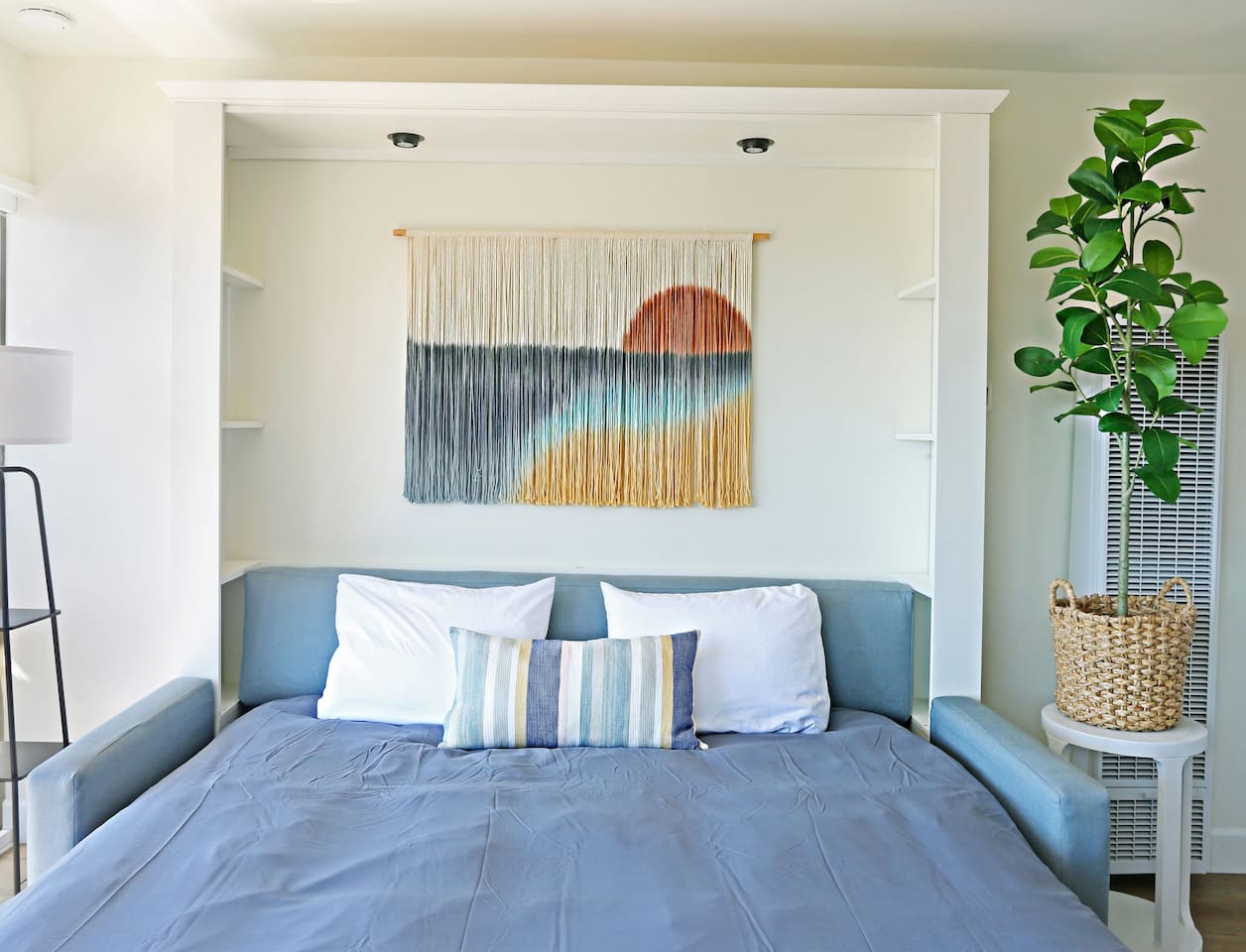 Here is a picture of the king-sized sofa murphy bed expanded. This bed is every bit as comfortable as a traditional bed with a premium mattress. This King murphy bed enables this one-bedroom loft to accommodate up to four people comfortably.