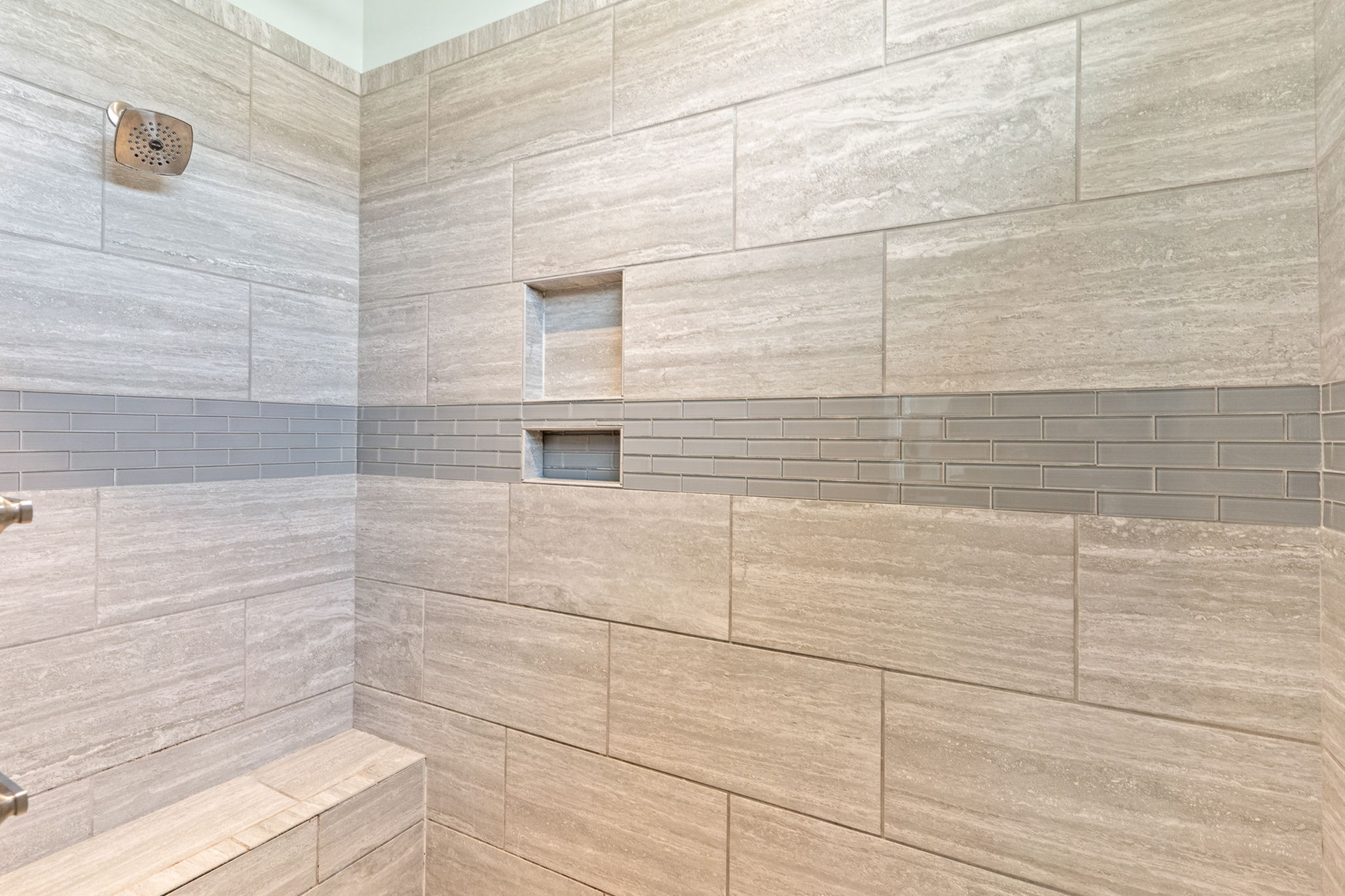 Walk-in luxury shower with regular and rainfall shower heads