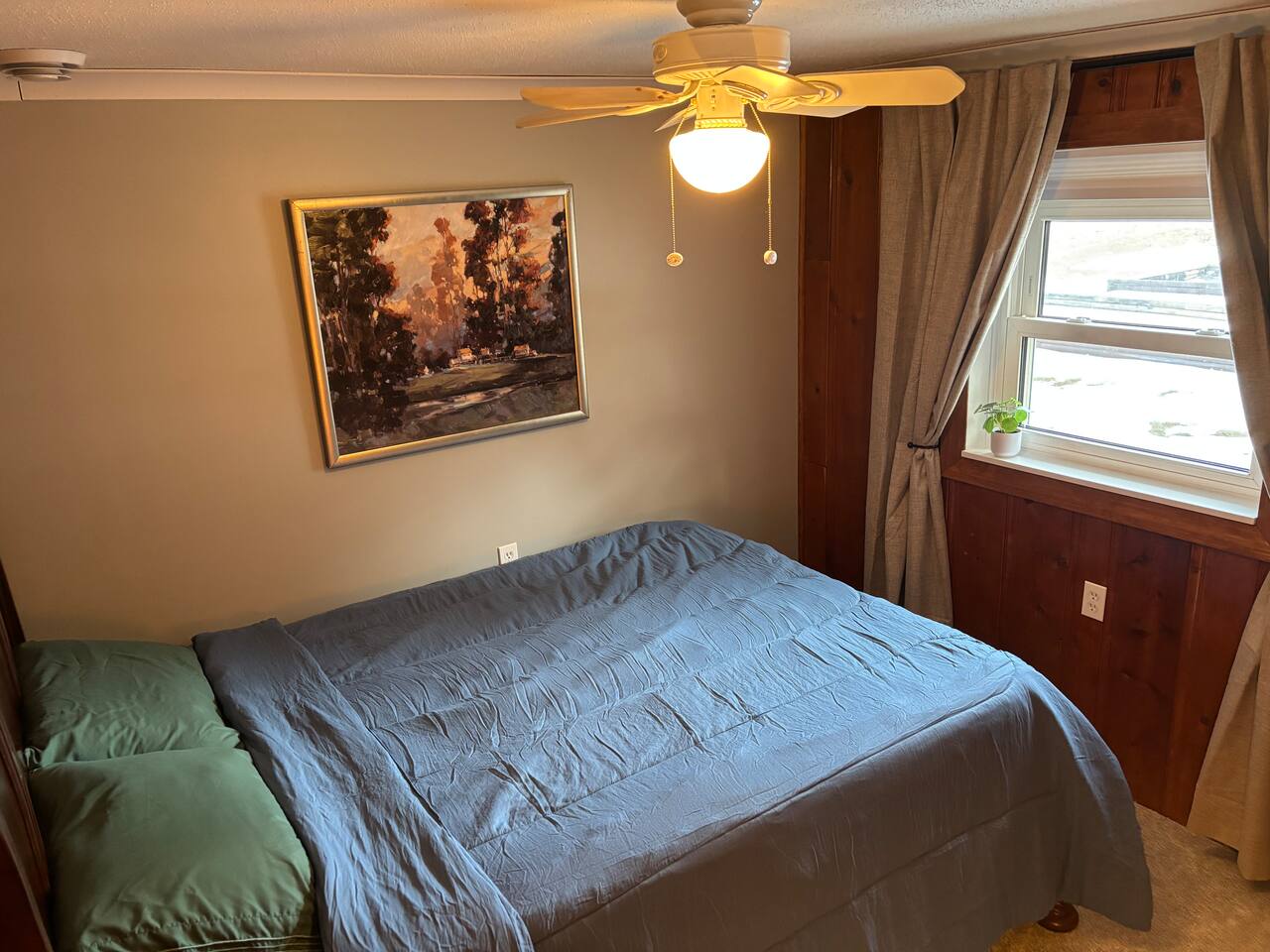 Very comfortable, queen size memory foam mattress, with silky-smooth sheets and comforter. Light filtering shade for privacy without lacking natural light. Insulated blackout curtains for extra comfort and darkness.