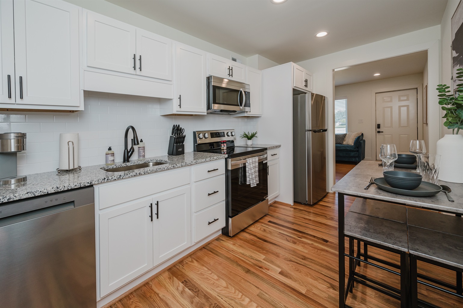Unit E also has its own full sized kitchen with dining options for four.
