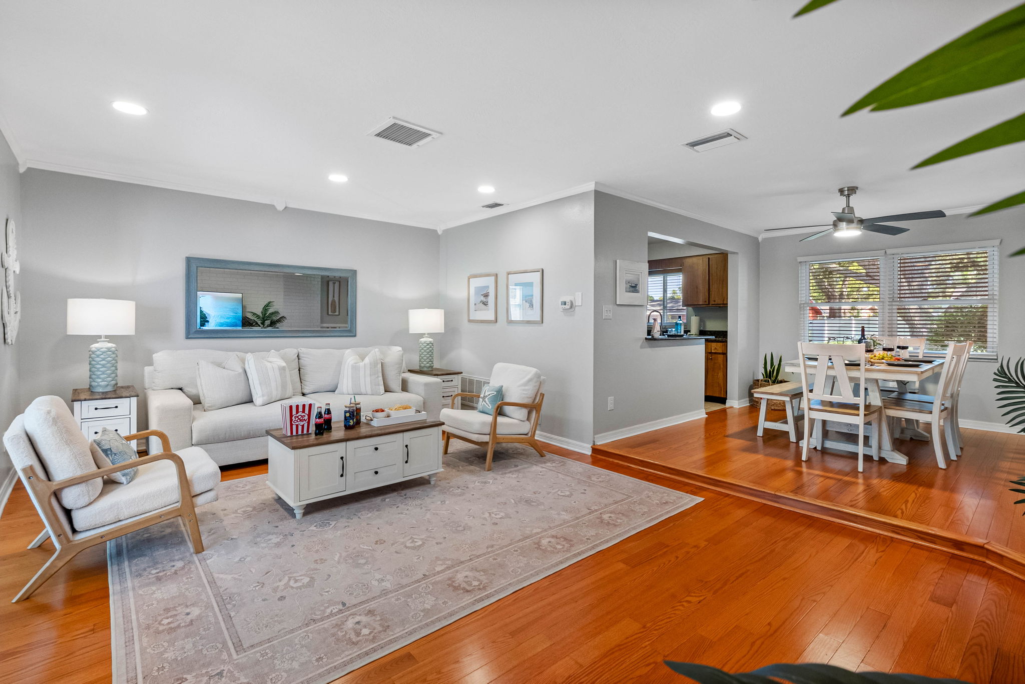 Natural light, warm floors, and cozy seating create a bright and welcoming spot to read, nap, or chat with friends.