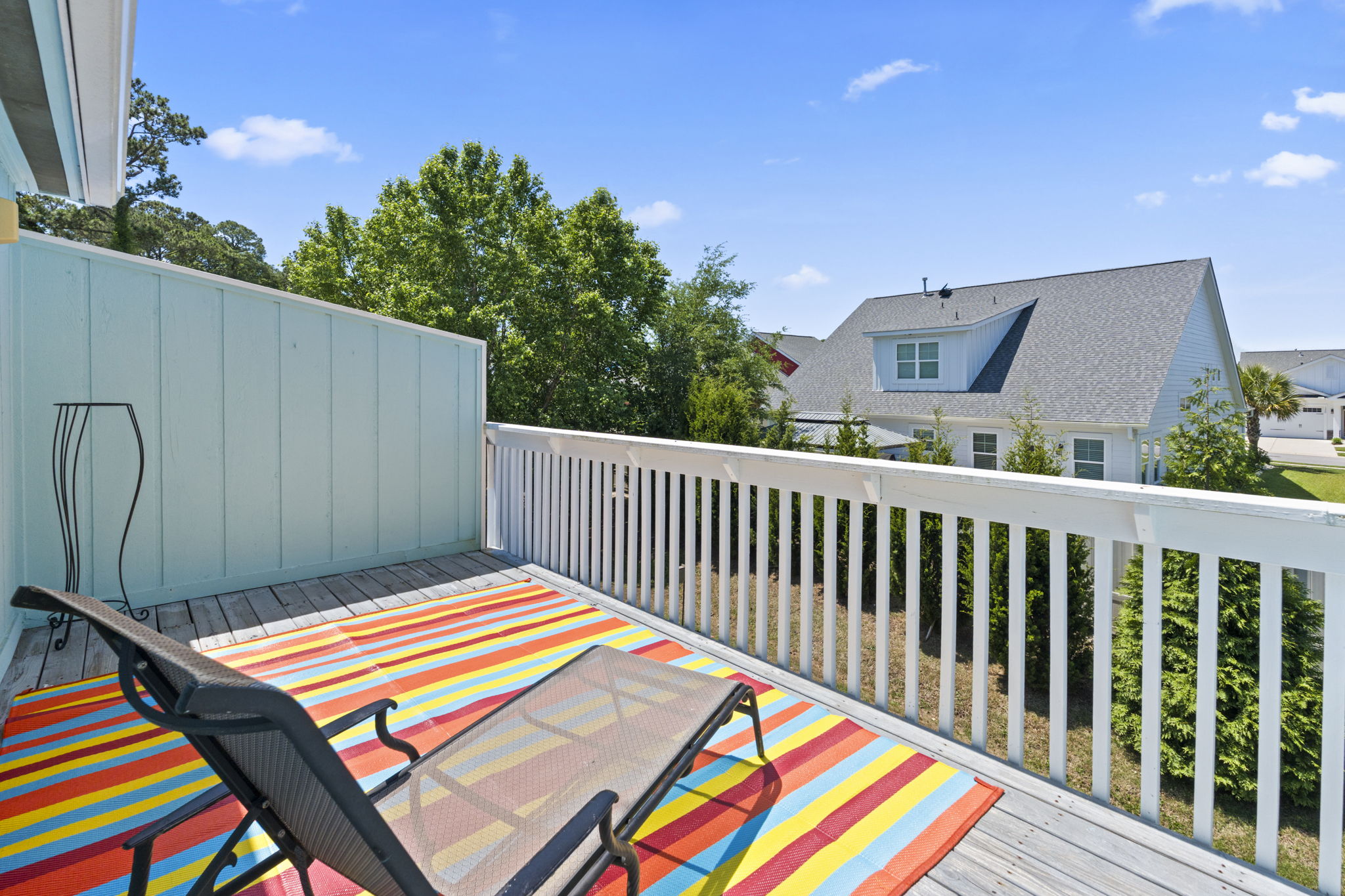 Enjoy the upstairs patio/sundeck connected to the Primary Bedroom