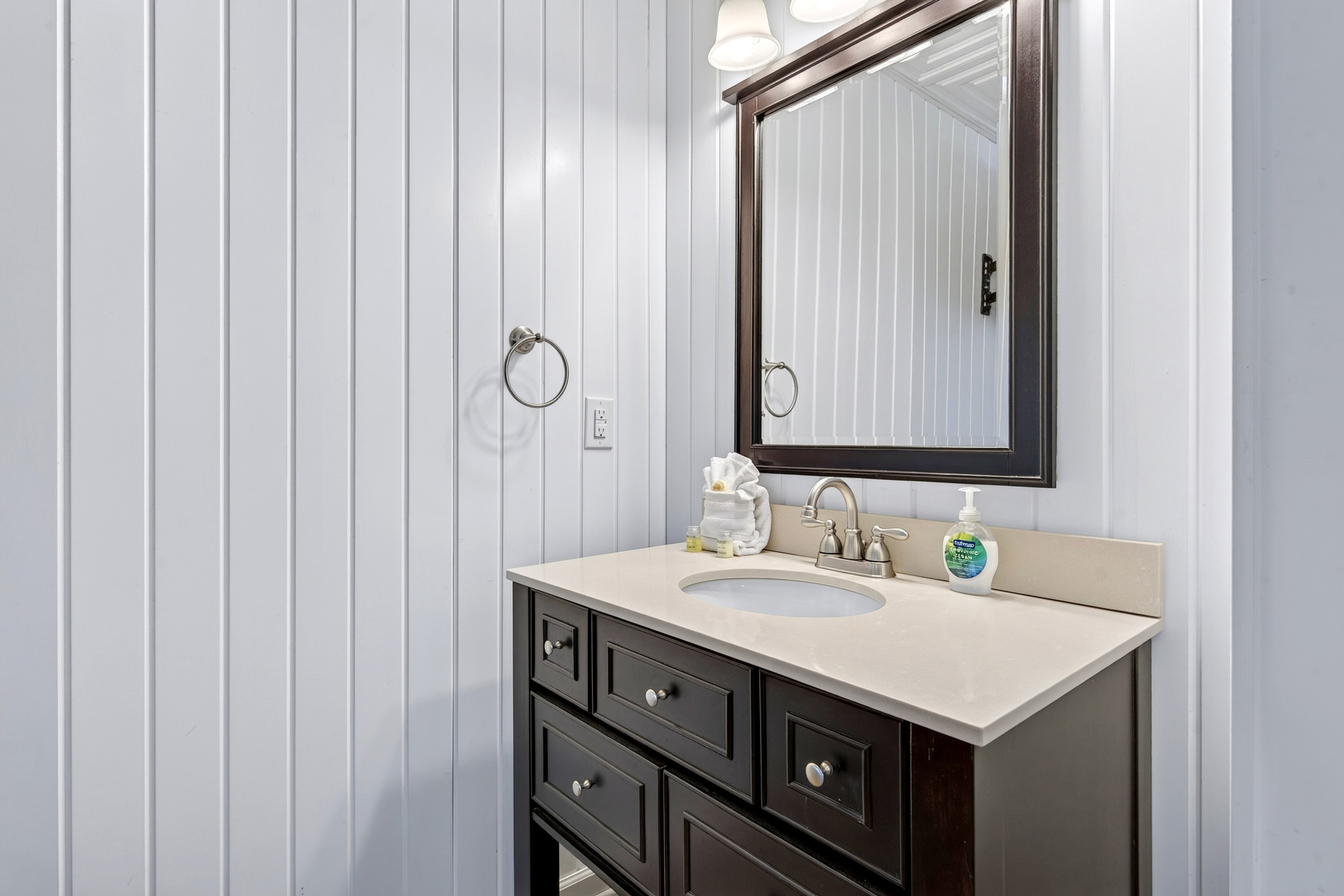Lower level sink outside the bathroom
