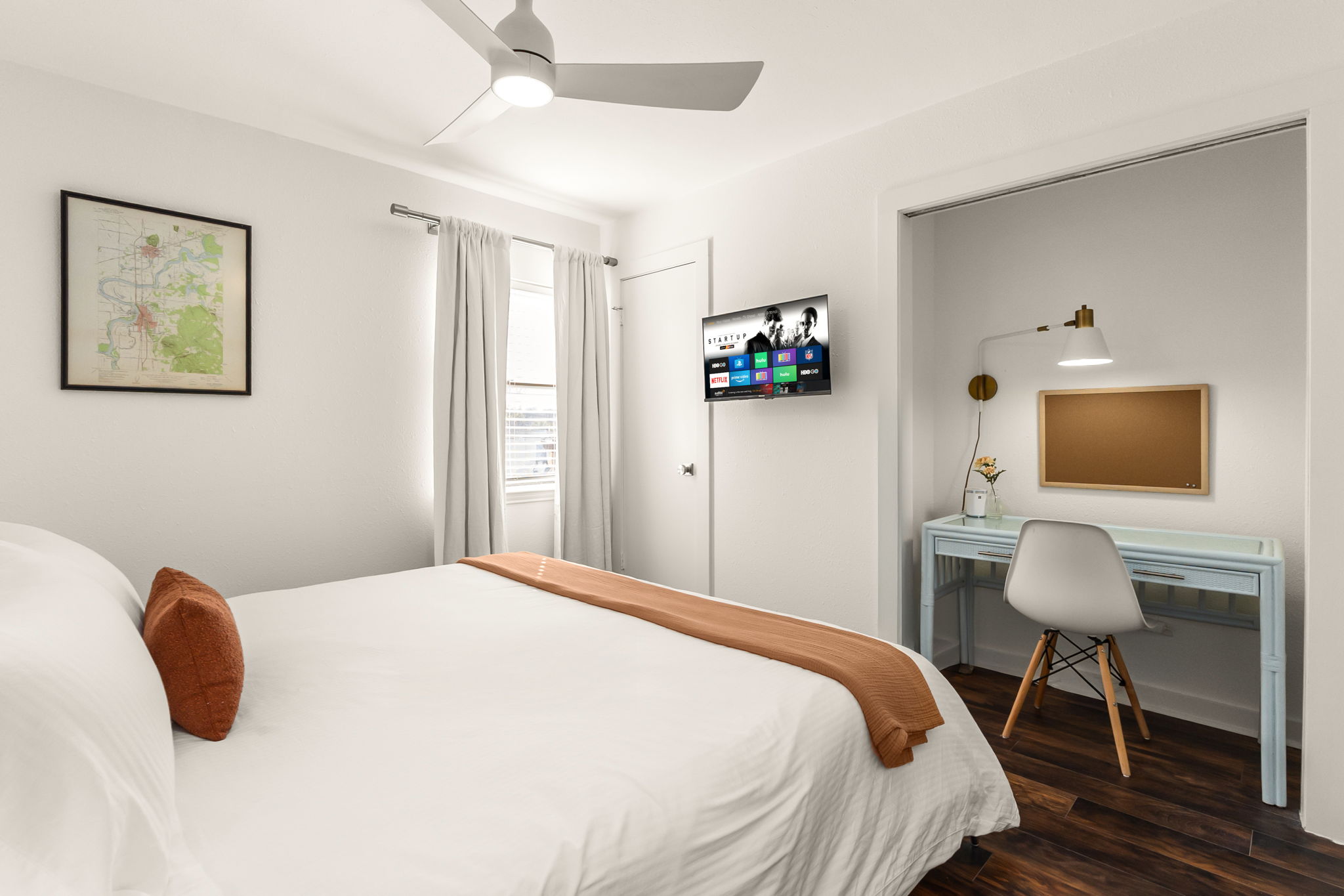 Bright bedroom with large windows for natural light