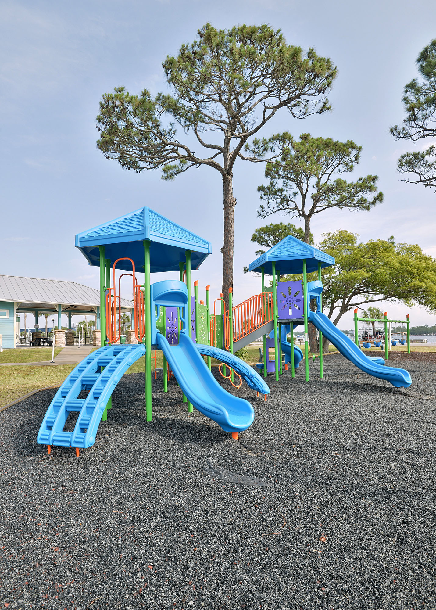 Playground for the kiddos....every time we take the trash in the golf cart, my 2-year-old wants to stop here "for (t)en minutes"