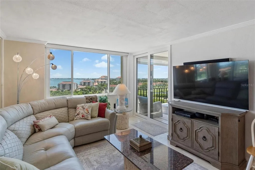 Bright and inviting, the living room is filled with natural light and offers a comfortable space to relax, stream your favorite shows, or unwind together while enjoying the coastal bay area ambiance.