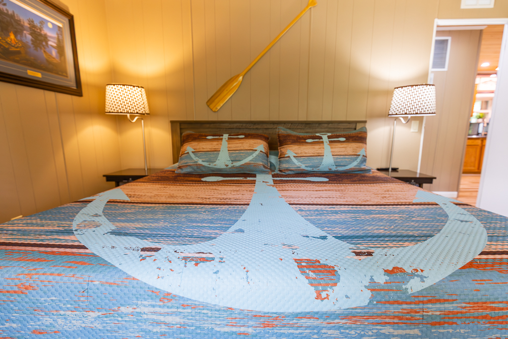 Anchor down and drift off—this lake-inspired bedroom is the perfect spot to recharge after a day on the water!