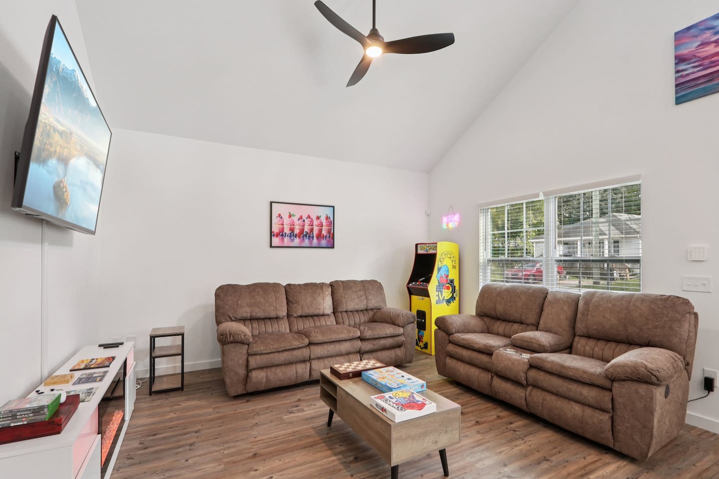 Full size Arcade Game with Pac-Man, Galaga, and 10 other Arcade classics. Smart TV with Xbox, board games, high-speed WIFI, reclining sofas