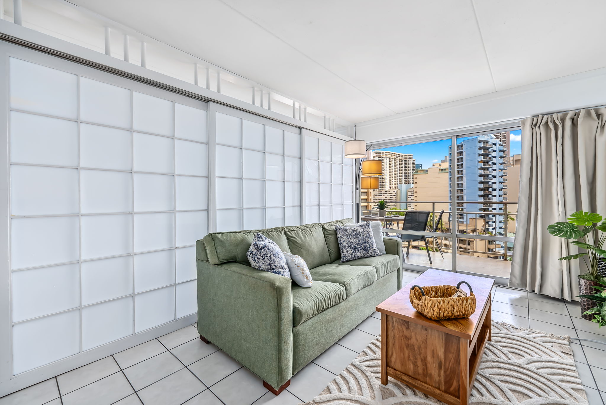 Living area off main bedroom area with shoji style sliding doors used to separate space and provide privacy 