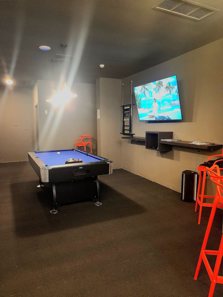 Take your pick—whether it's foosball or pool, this room guarantees hours of entertainment.