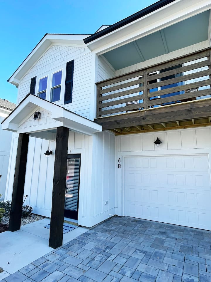 Convenient covered garage space with easy private access to the home.