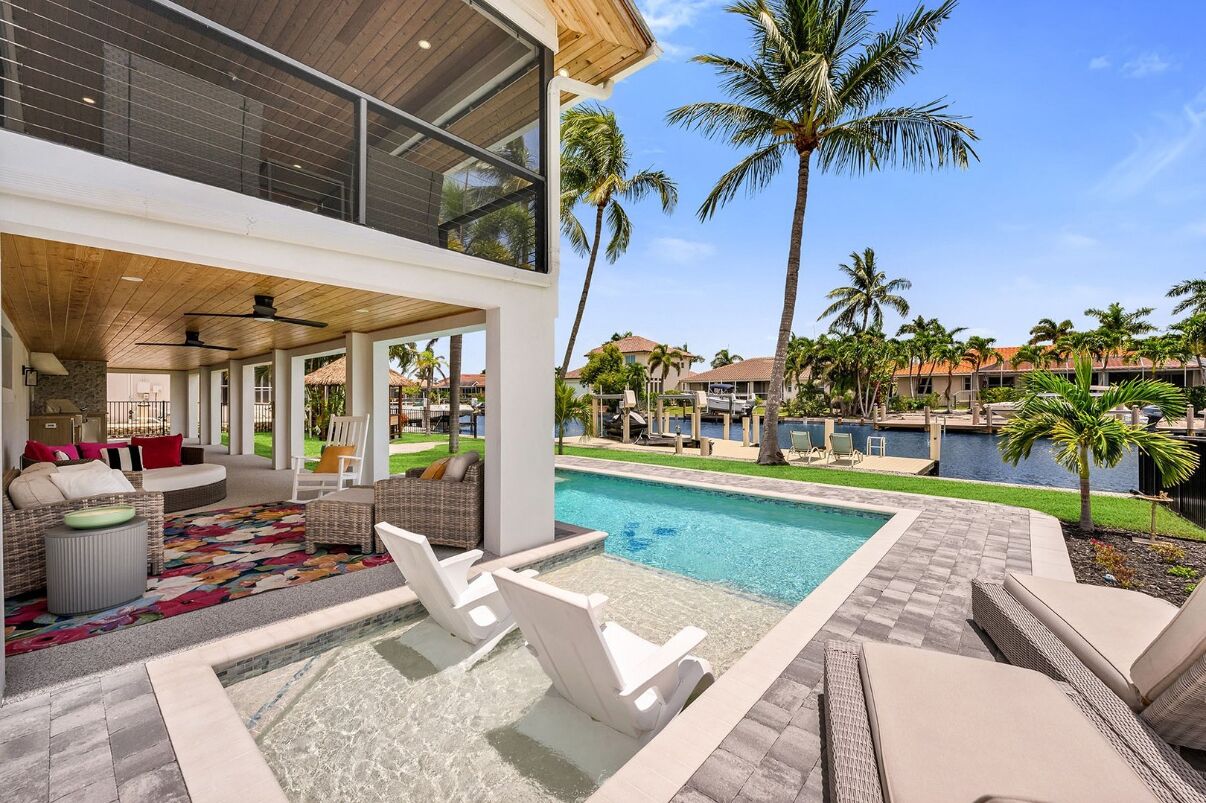 Pool & two patios overlooking the water
