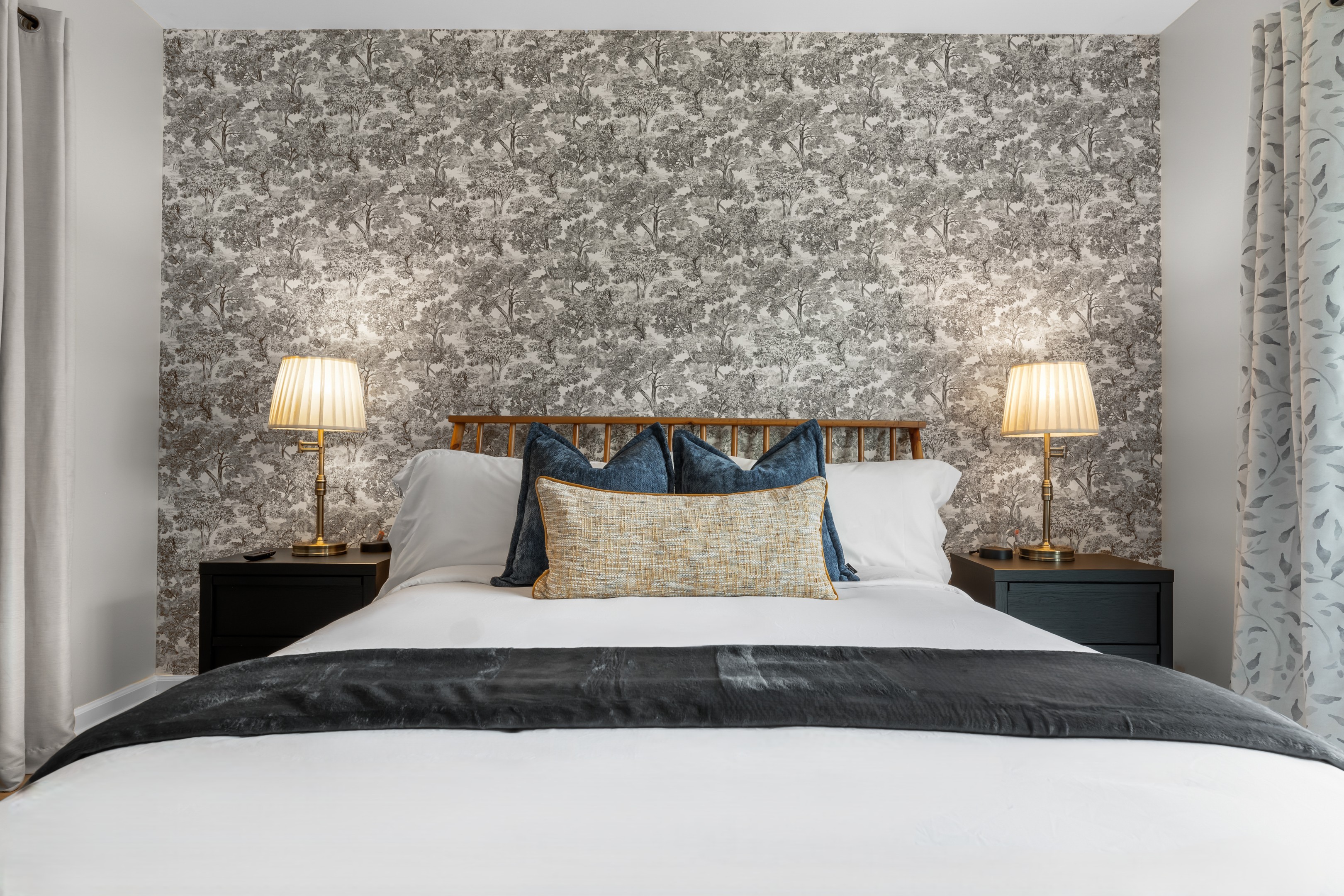 Beautifully styled bedroom with a plush, relaxing vibe.