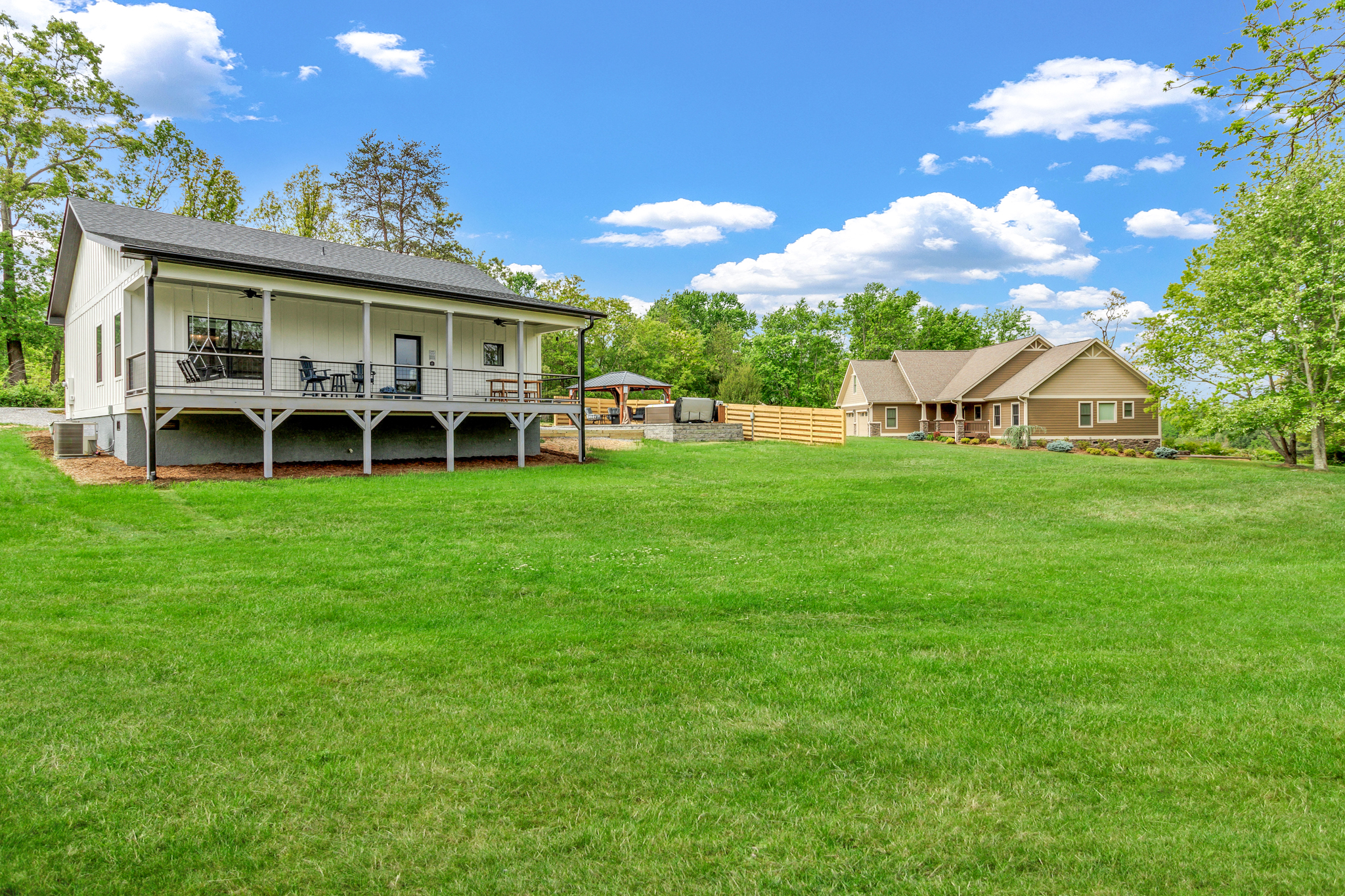 Backyard looking at house - house on right is the closest neighbor. With privacy fence you feel very secluded