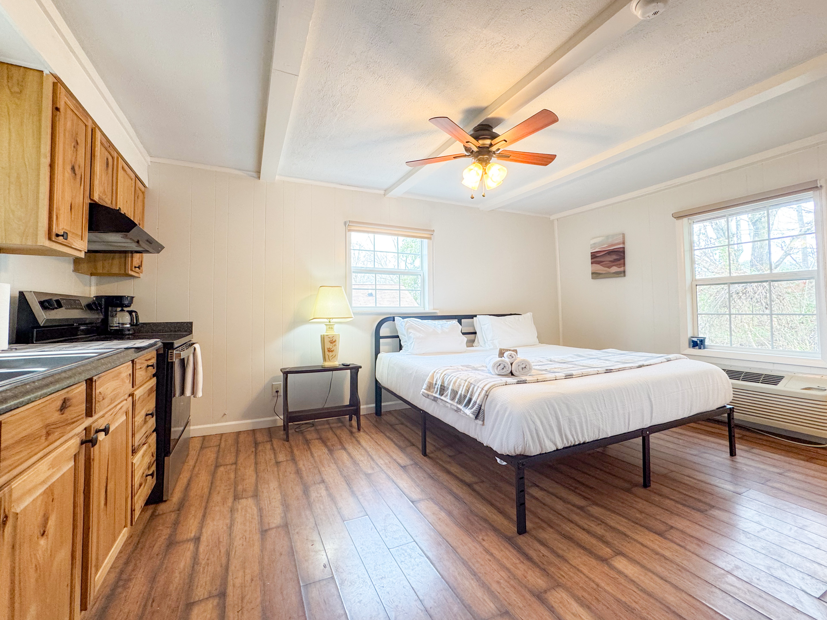 The separate apartment suite features a comfy King size bed with cooling memory foam gel and high thread count bedding. There is a smart TV, a small ensuite bathroom, refrigerator, coffee maker, and some kitchen items. Mostly for drinks and such.
