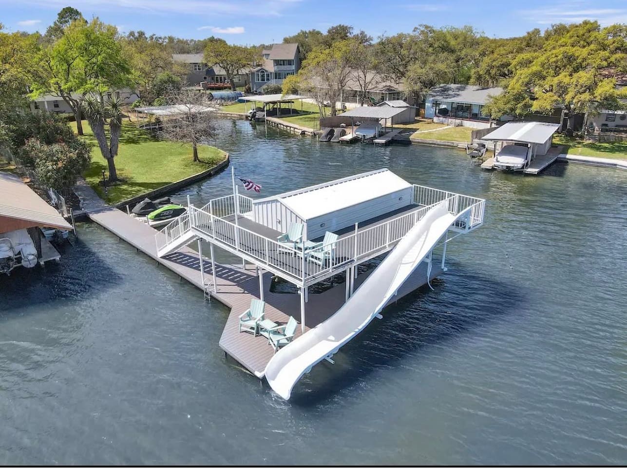 Aerial view of lakehouse dock and waterslide