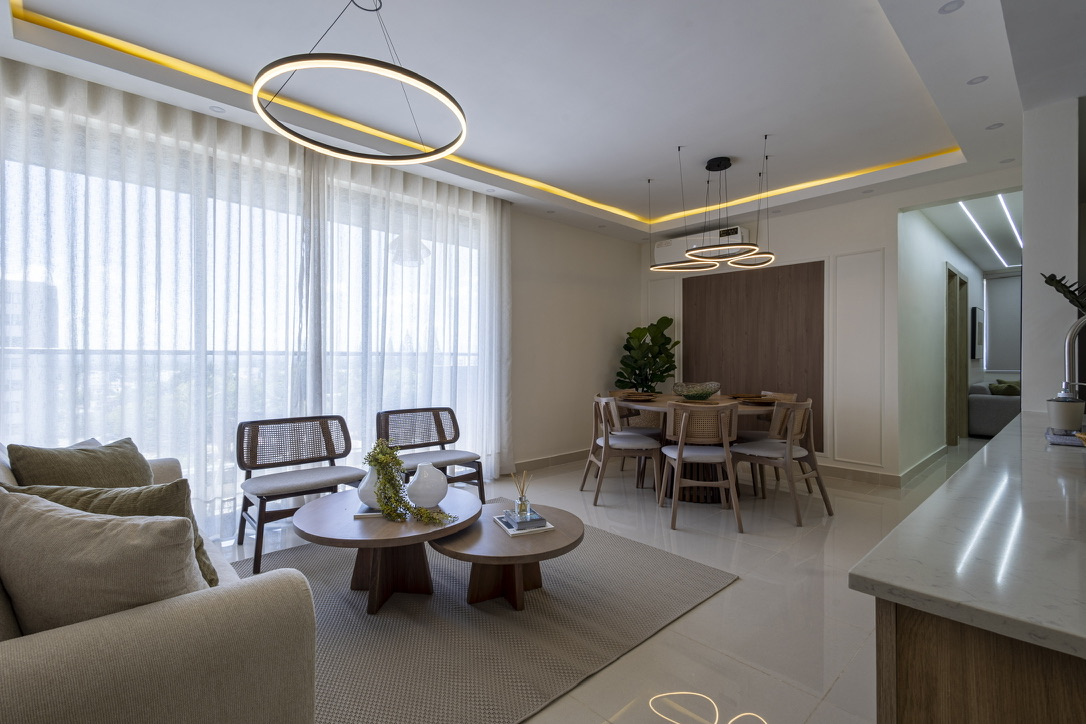 An inviting open-concept space where the living room, dining area, and kitchen come together beautifully. 🤍✨