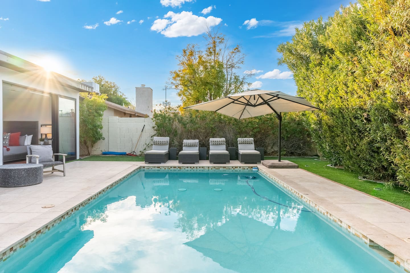 Step from the bedroom straight onto the pool deck and enjoy poolside morning coffee or an evening dip under the soft sunlight.