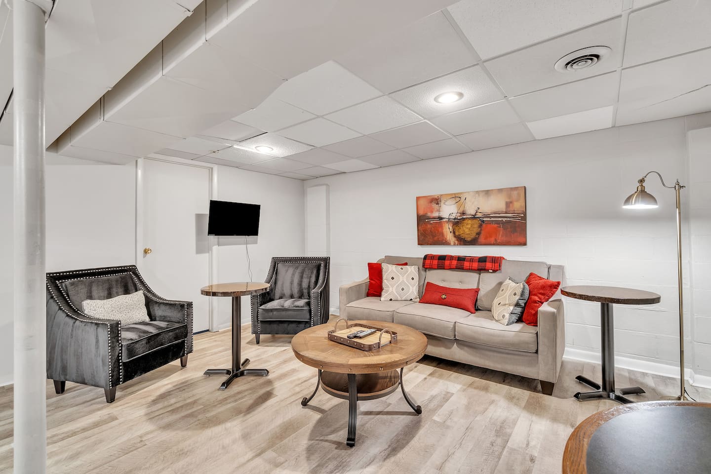 The basement living room is perfect for gathering with friends and family and creating unforgettable moments.
