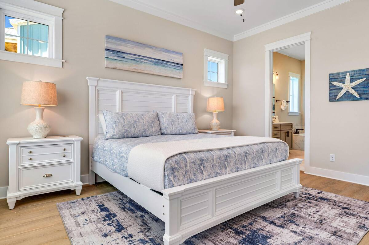 King Bedroom #1 features a plush king bed and a 50" Roku TV for streaming and relaxation. Every bedroom in the home is equipped with its own 50" Roku television for personalized entertainment.