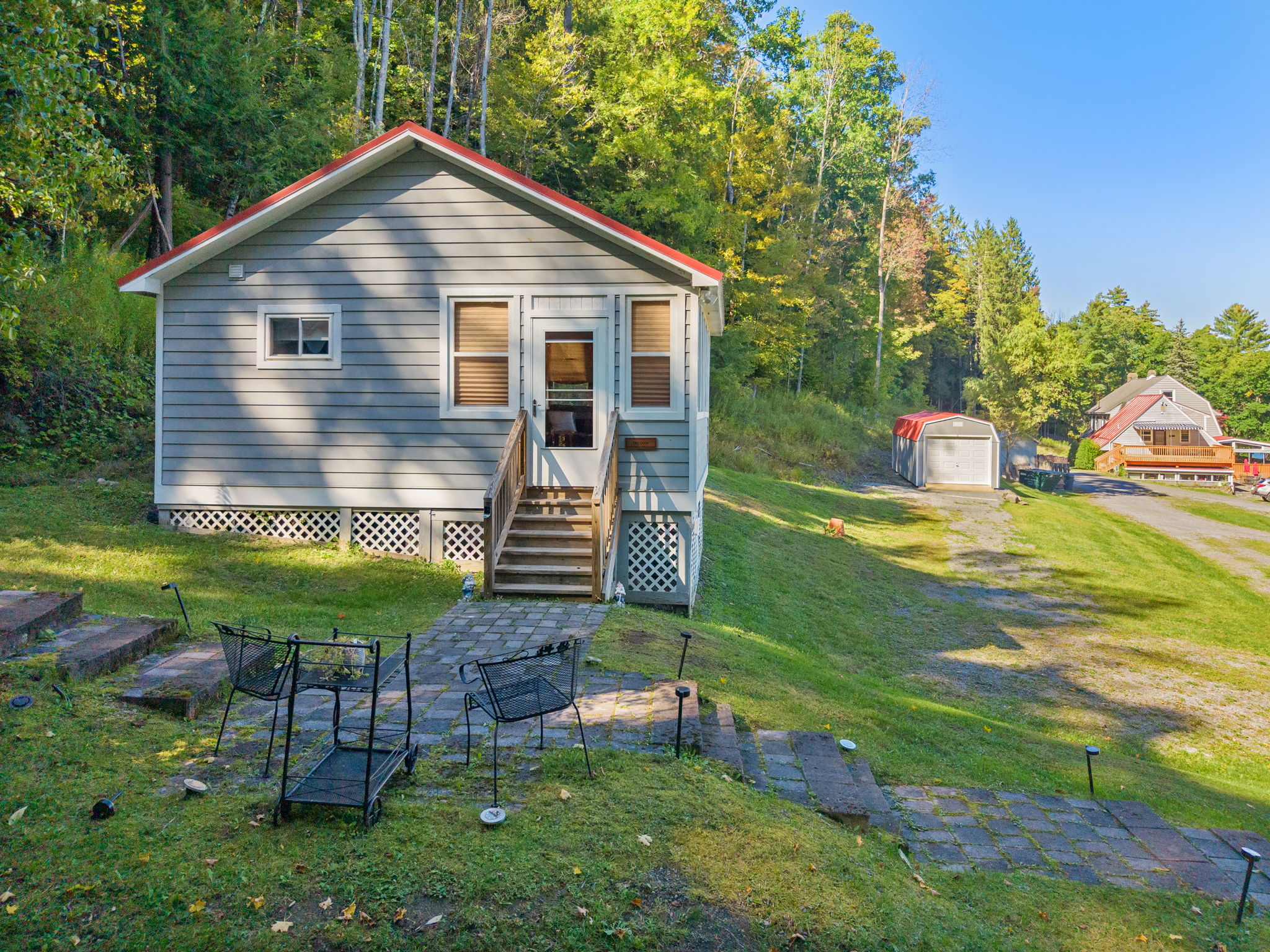 Hatch's Coop - quaint 1 bdrm cottage. Hatch's Nest, Perch and Main Lodge are visible is the background. Rent the whole compound or only a few houses, its up to you! 