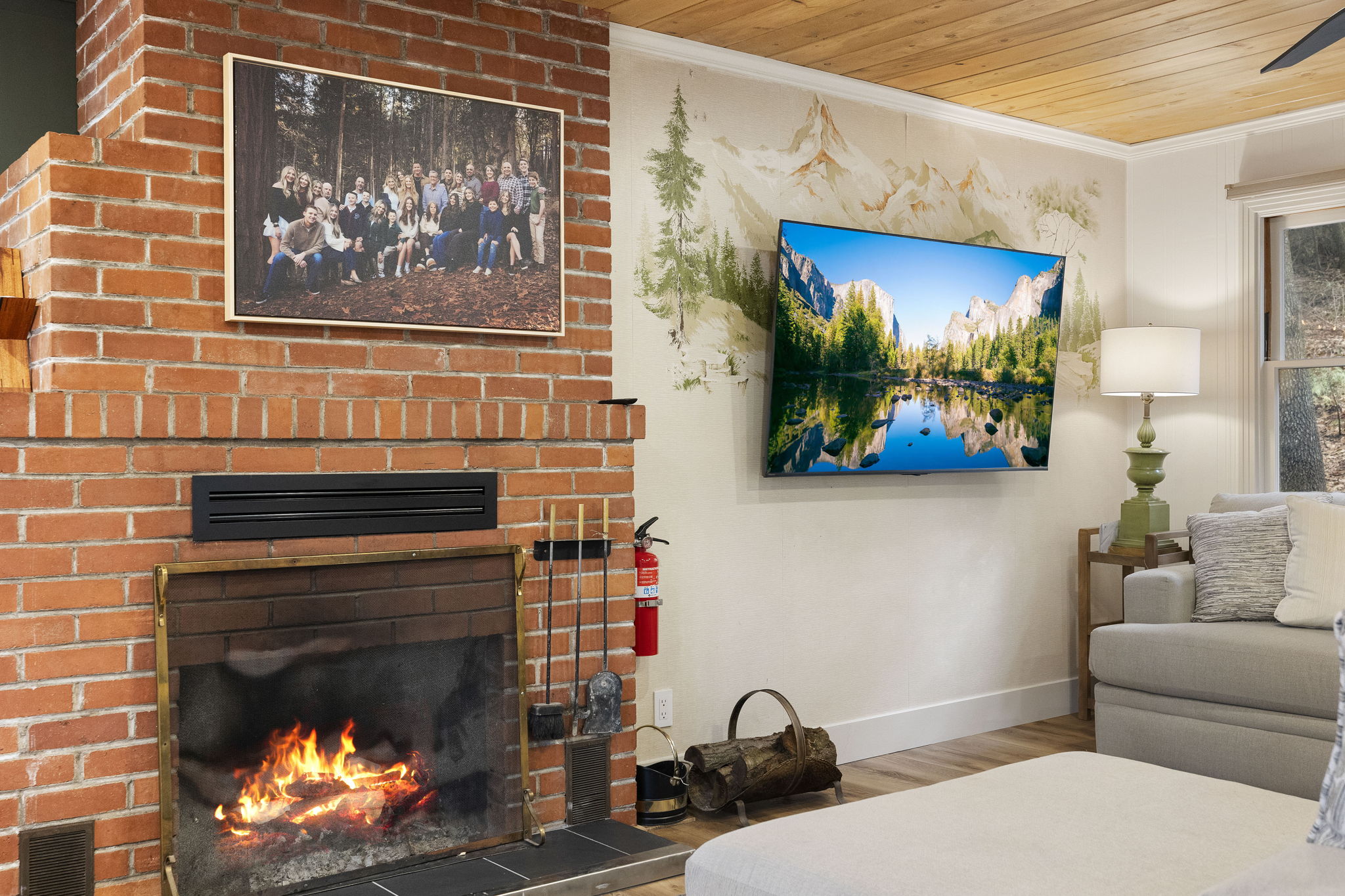 Wood burning fireplace in the living room - near the kitchen and dining rooms as well, makes the whole cabin feel cozy. Wood is provided.