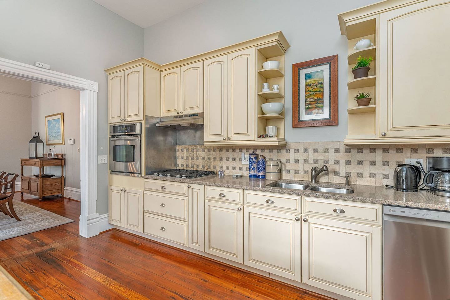 Bright, open kitchen with a new refrigerator (not pictured), wine fridge, and all of the appliances you'd expect in a high-end rental.  Gas stovetop and ample counter space to let the cook in your crew to work his/her magic.