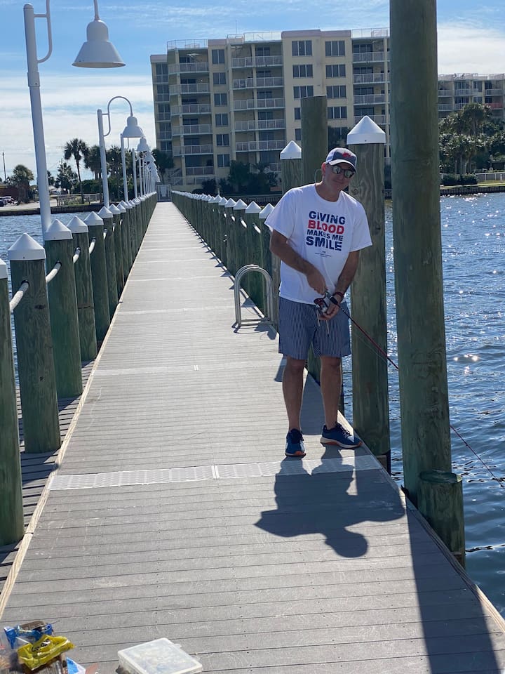 One of my best friends fishing from the bayside dock after a long morning of taking drone vidoes for us