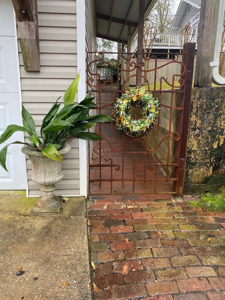 Entry gate to unit. Unit is upstairs above garage. 