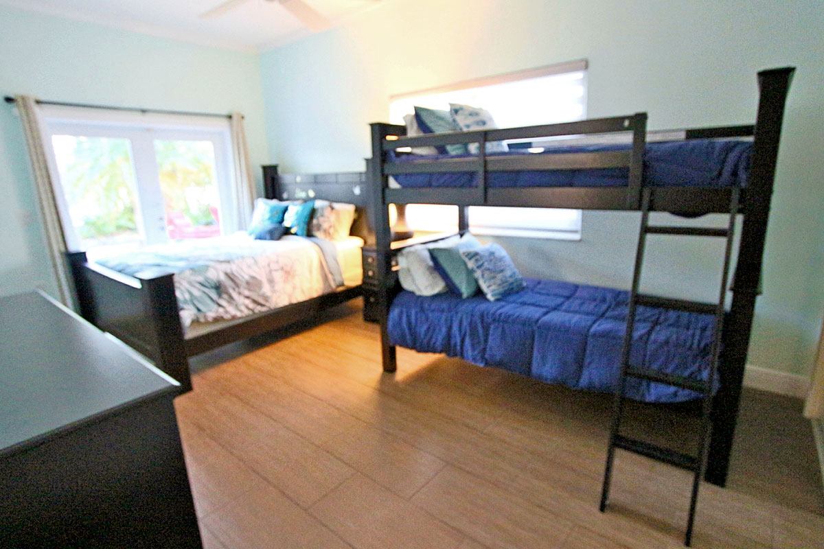Queen bedroom with twin bunk beds