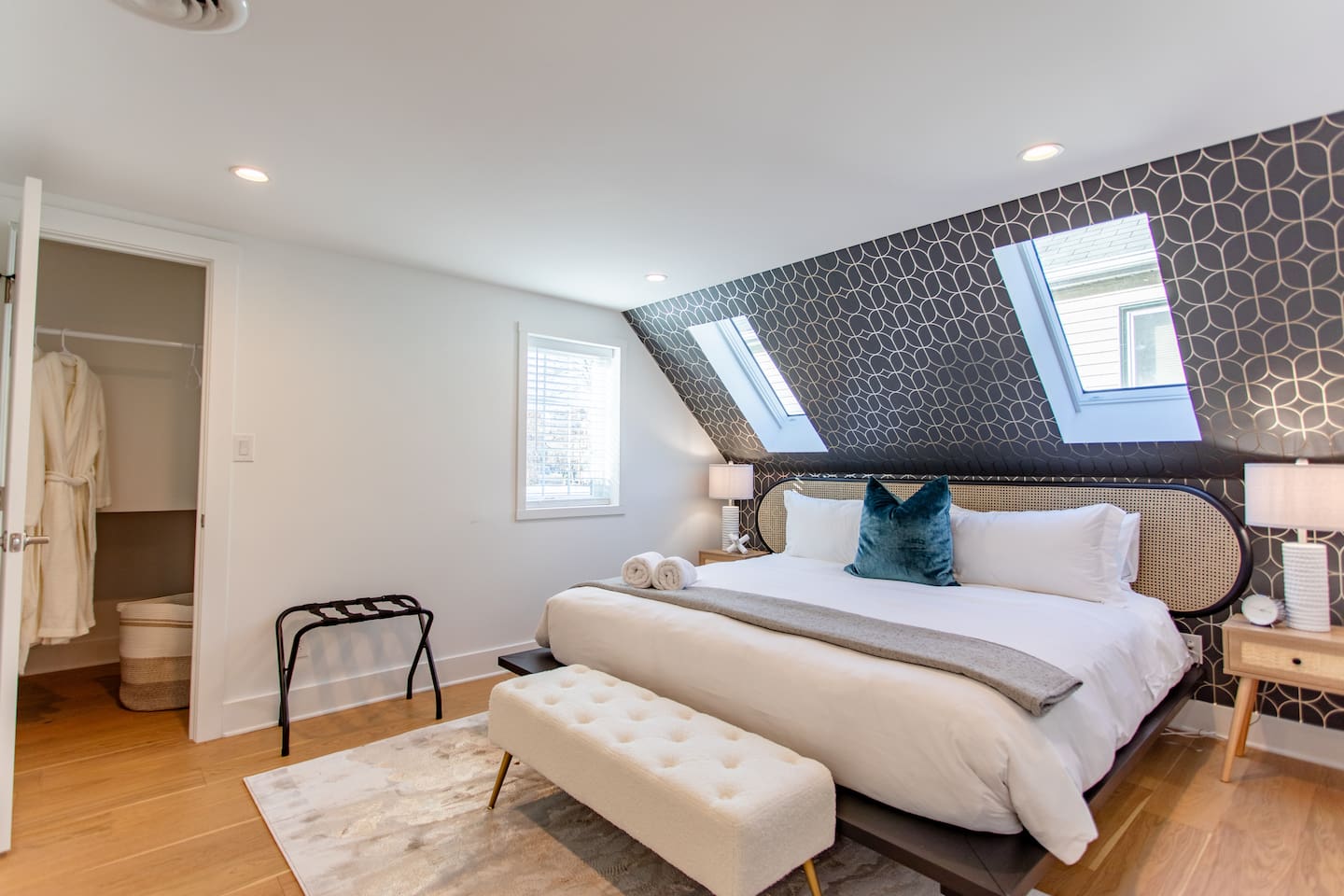 Cozy bedroom featuring an upper window, allowing natural light to flood the space while maintaining privacy and a serene atmosphere.