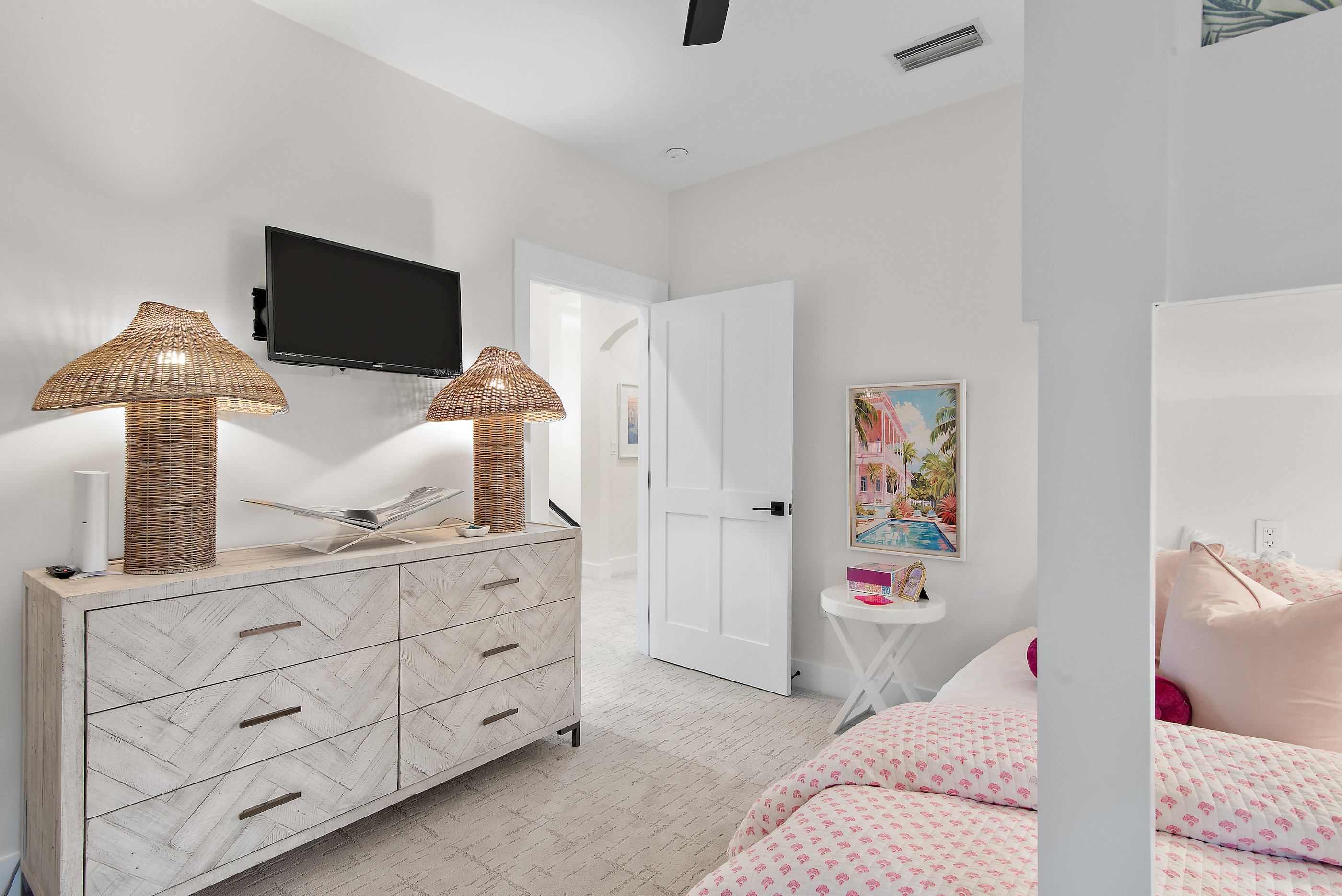 A large dresser and closet provide ample space for everyone's clothes.