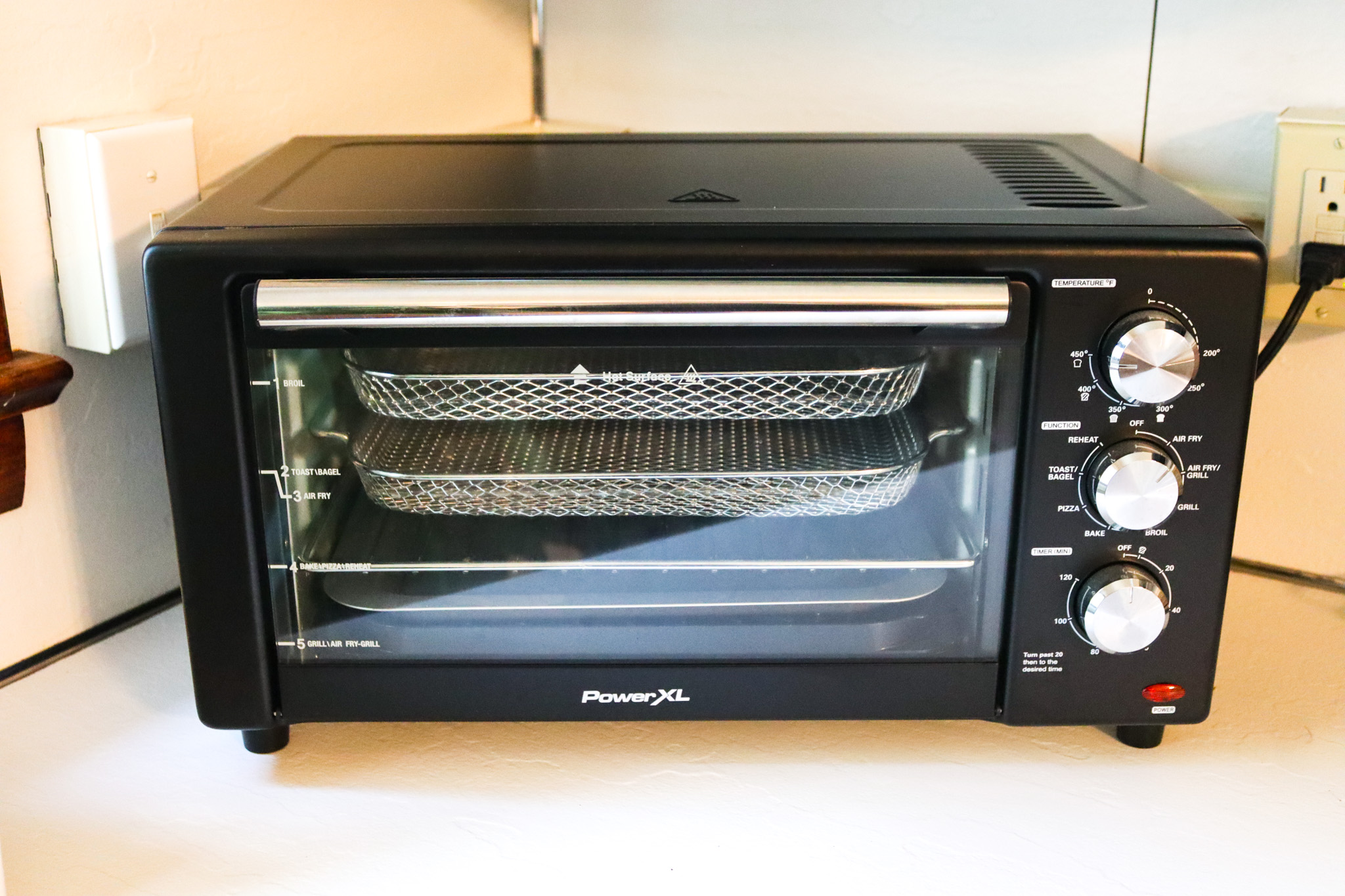Cook your favorites with ease using the versatile air fryer, toaster oven, and indoor grill—all in one convenient appliance.