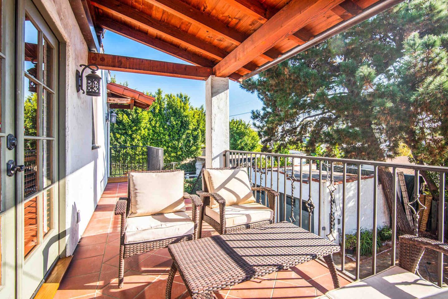 Private terrace with seating off the primary bedroom. 