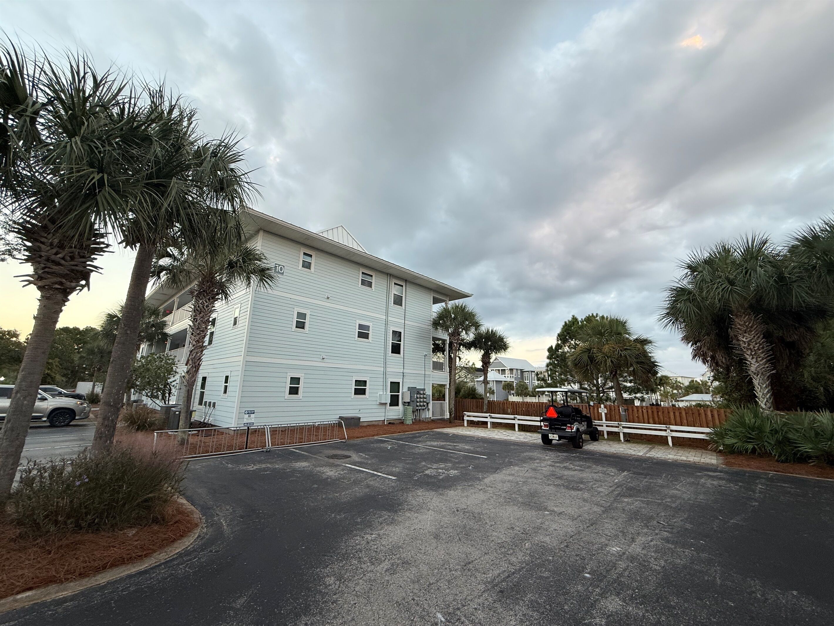 Golf cart charging station and bike rack conveniently located right next to our building