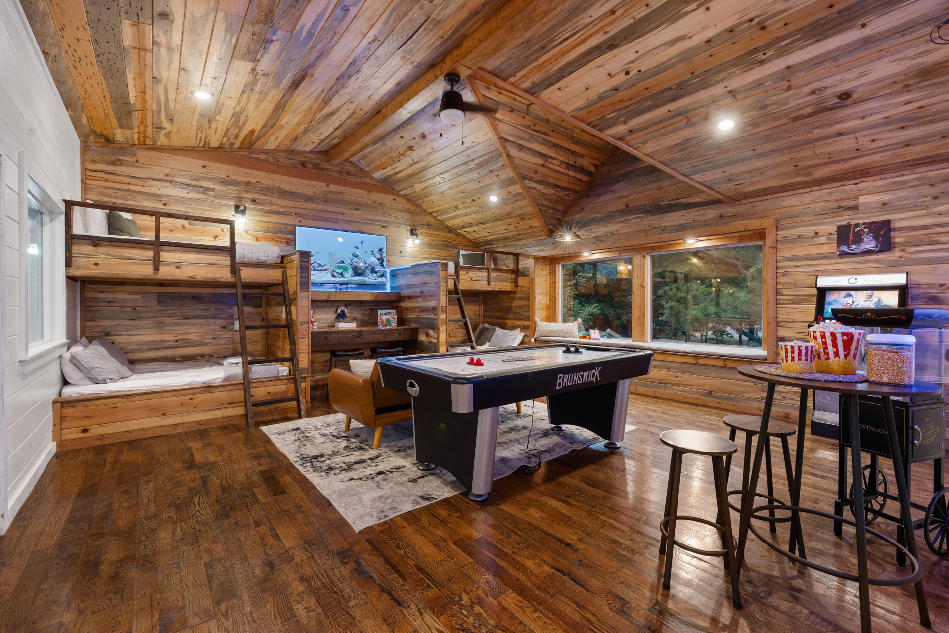 Upstairs bunk room fun with built in core memory potential. 
Late night laughs, tournament rematches, and cozy cabin sleepovers all in one unforgettable hangout space.