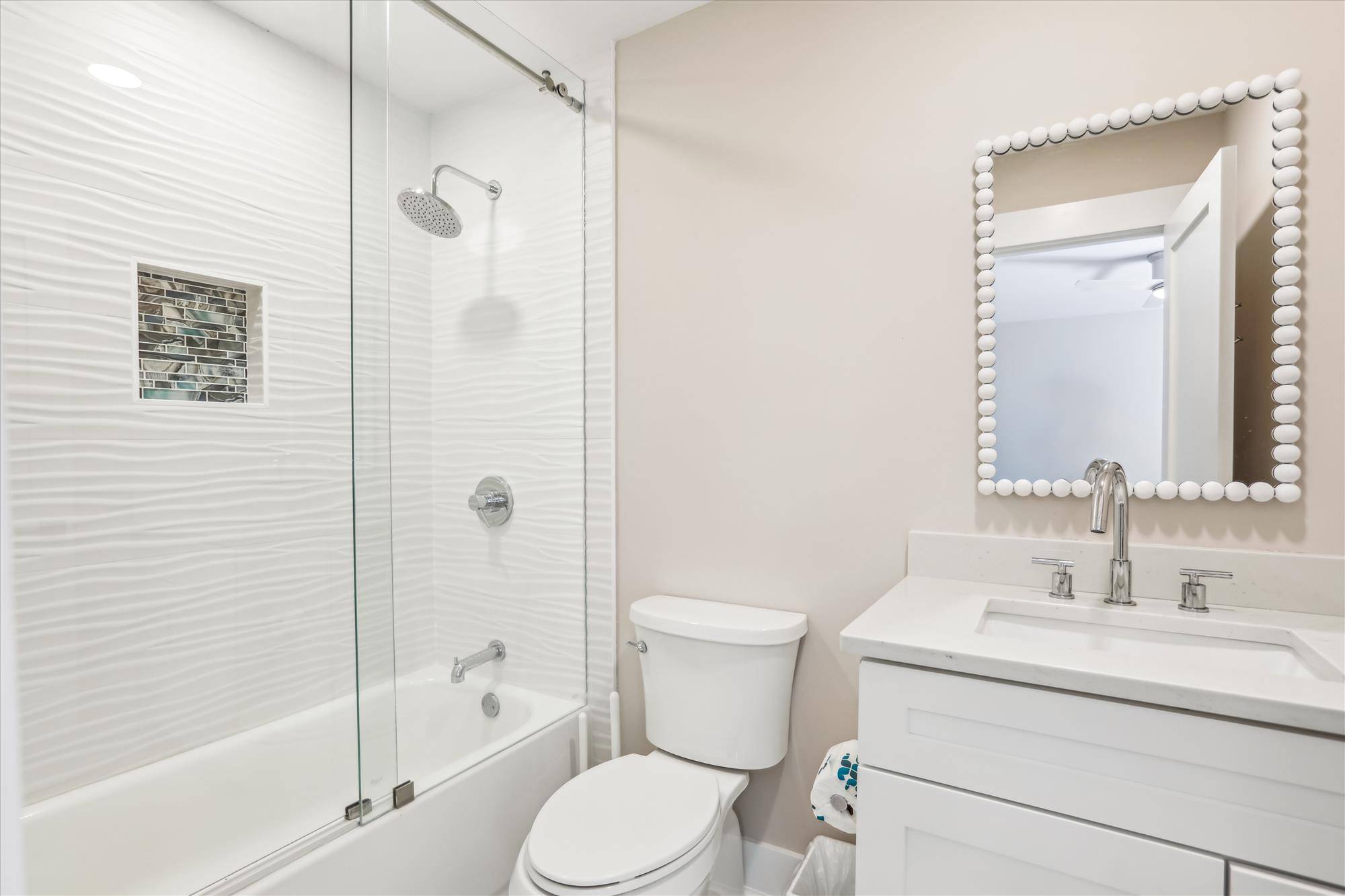 Bathroom for twin bedroom feature tub/shower combo and single sink