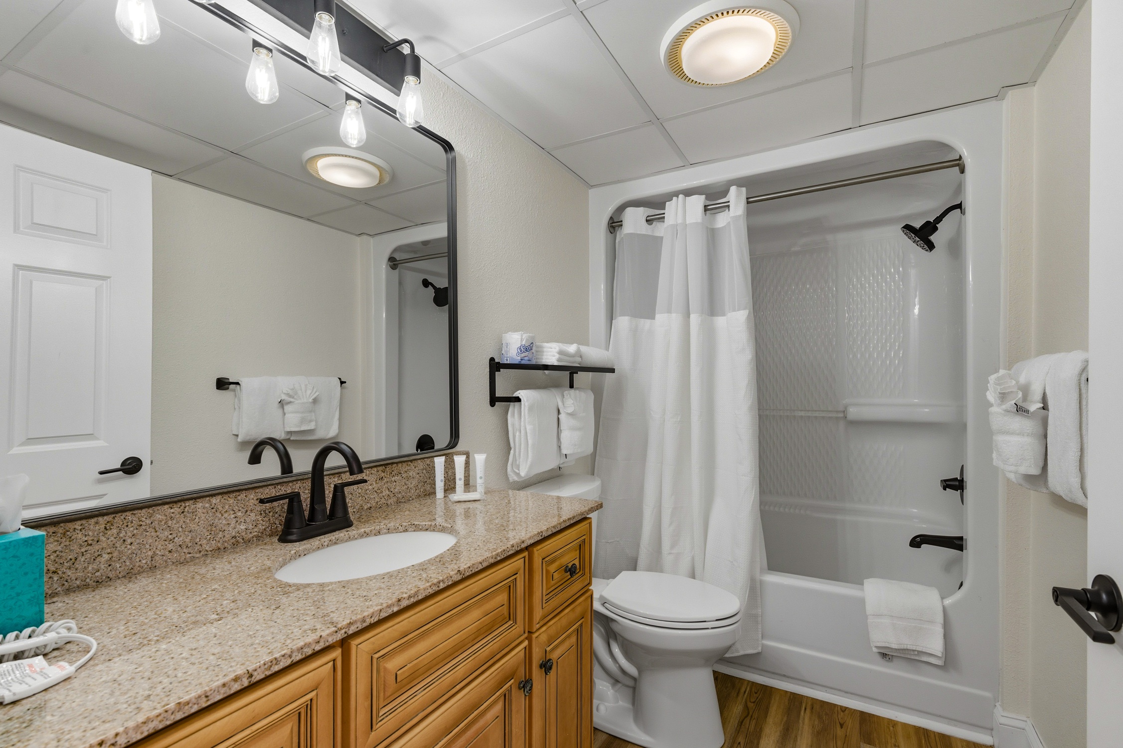 Bathroom with tub and shower