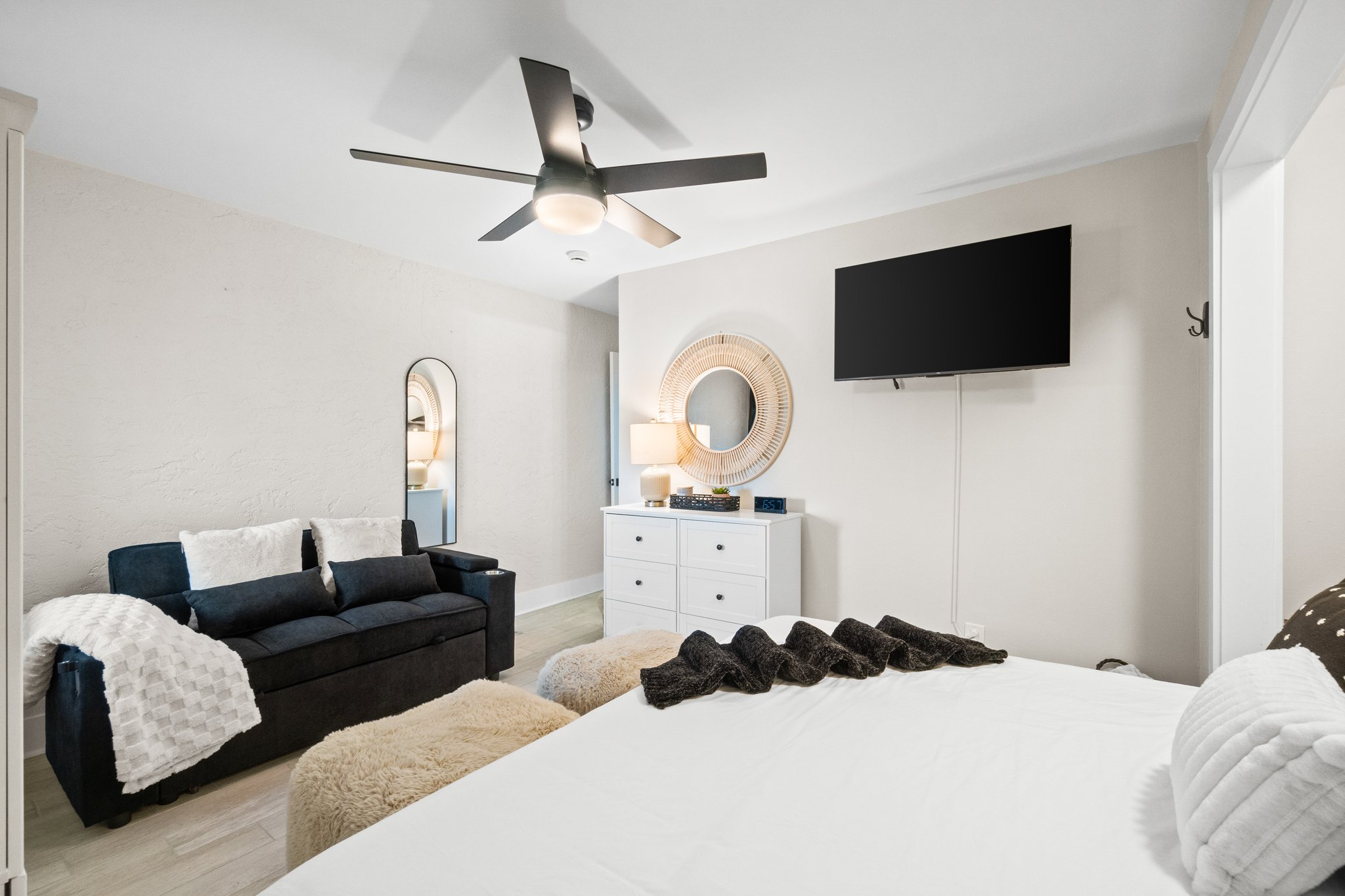 bedroom with sleeper sofa to provide many options for sleeping