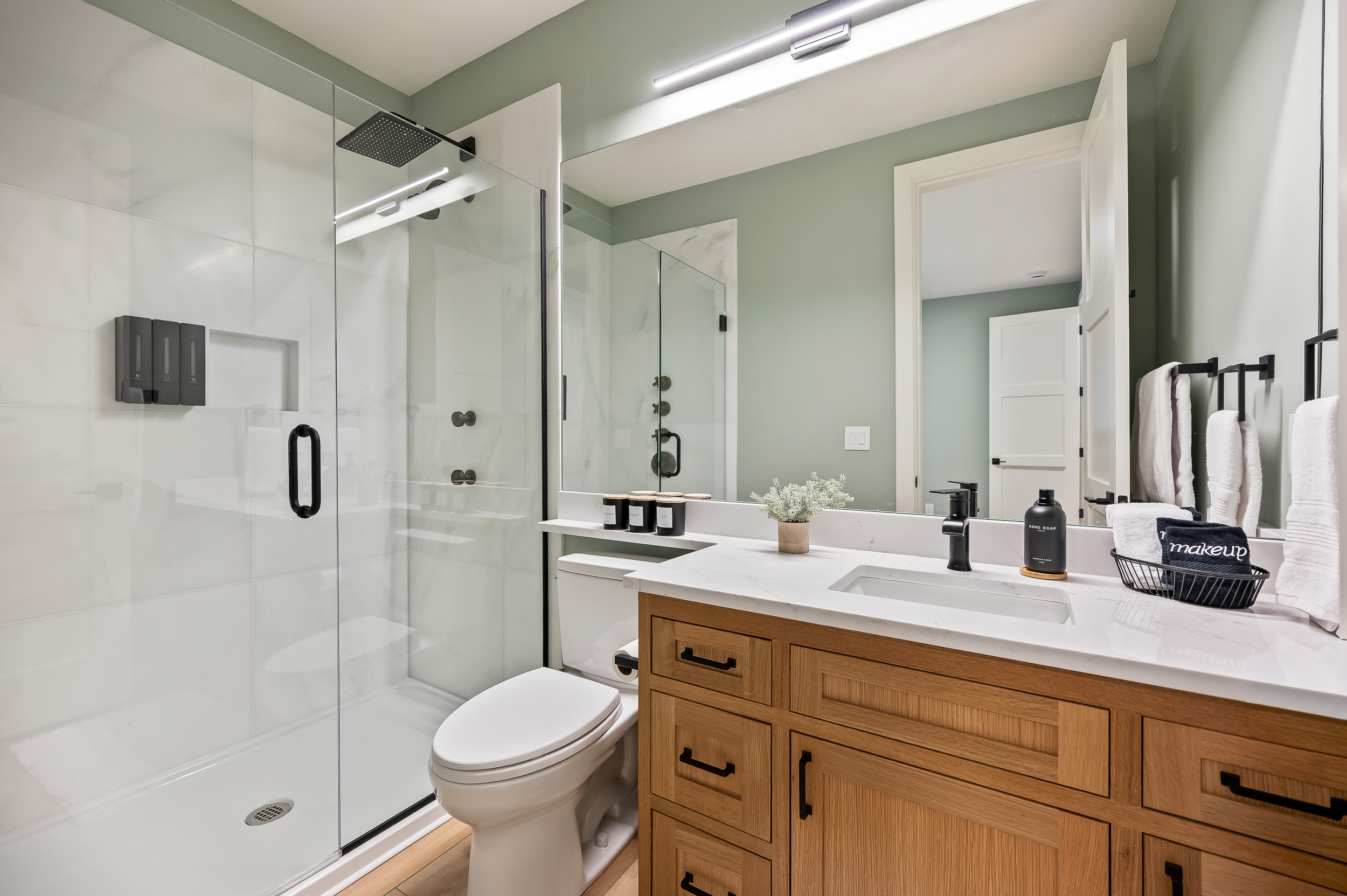 Bathroom #2 of 8 - Main floor, en suite to bedroom #2 with walk-in shower